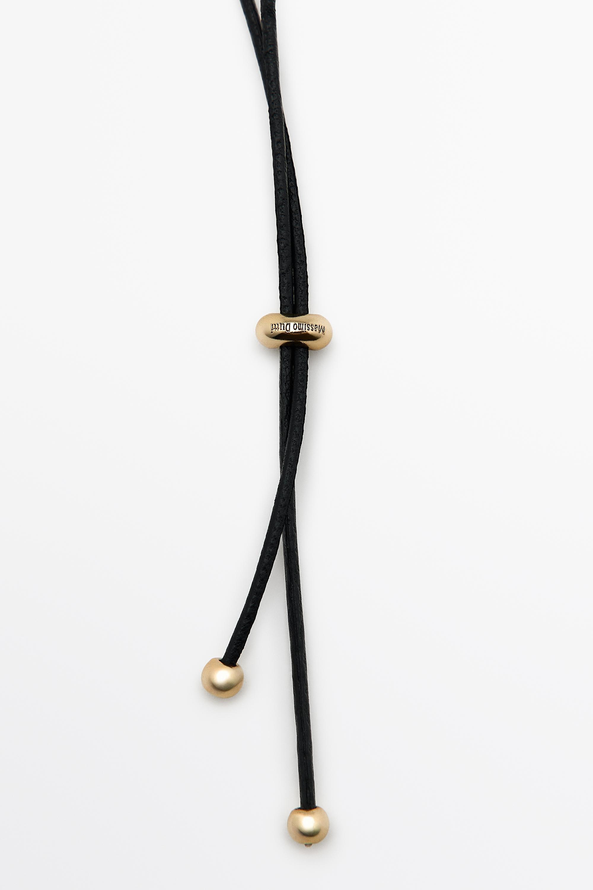 Twist hoop necklace — GOLDEN