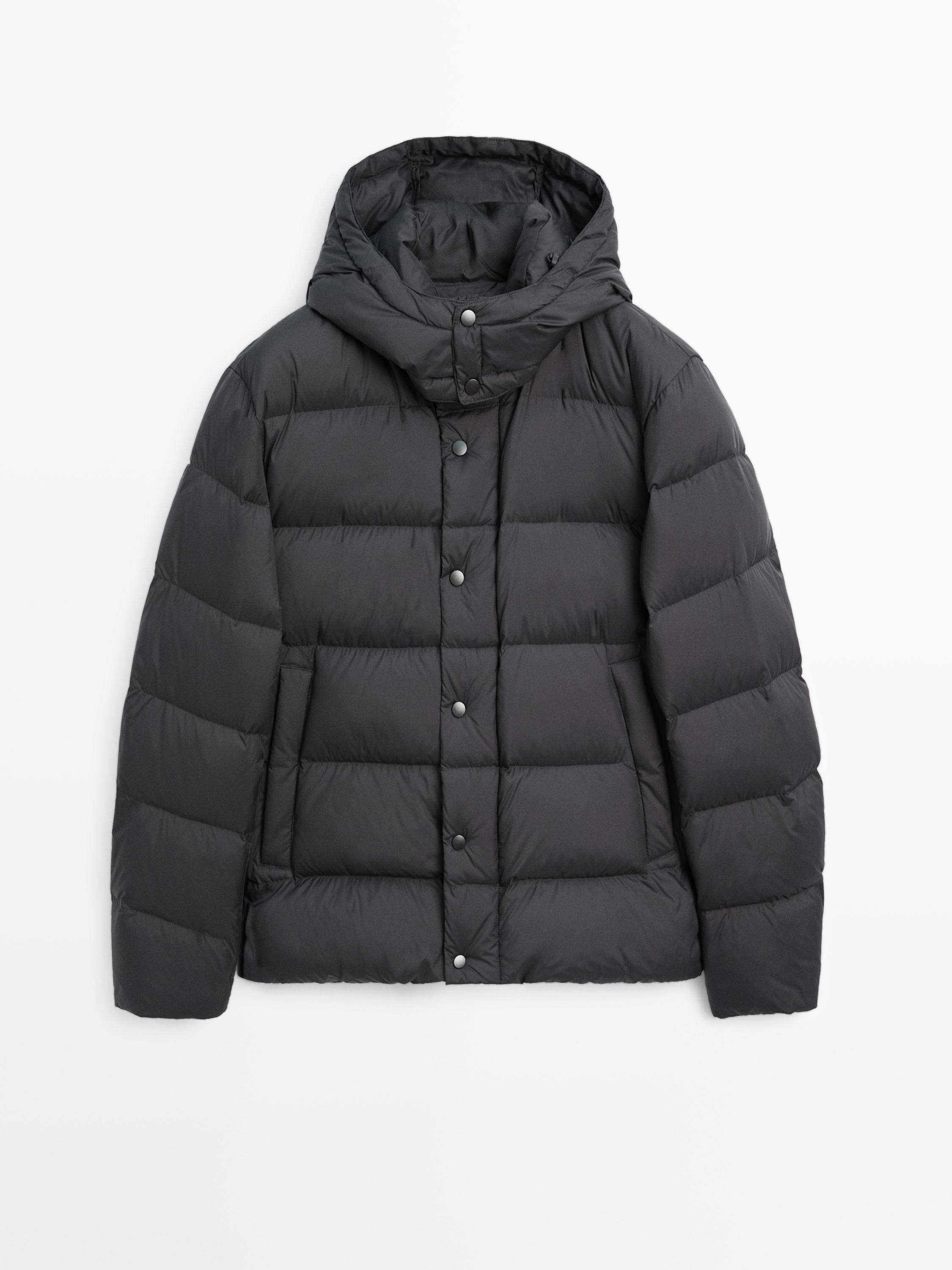 Jaqueta embuatada caputxa water repellent