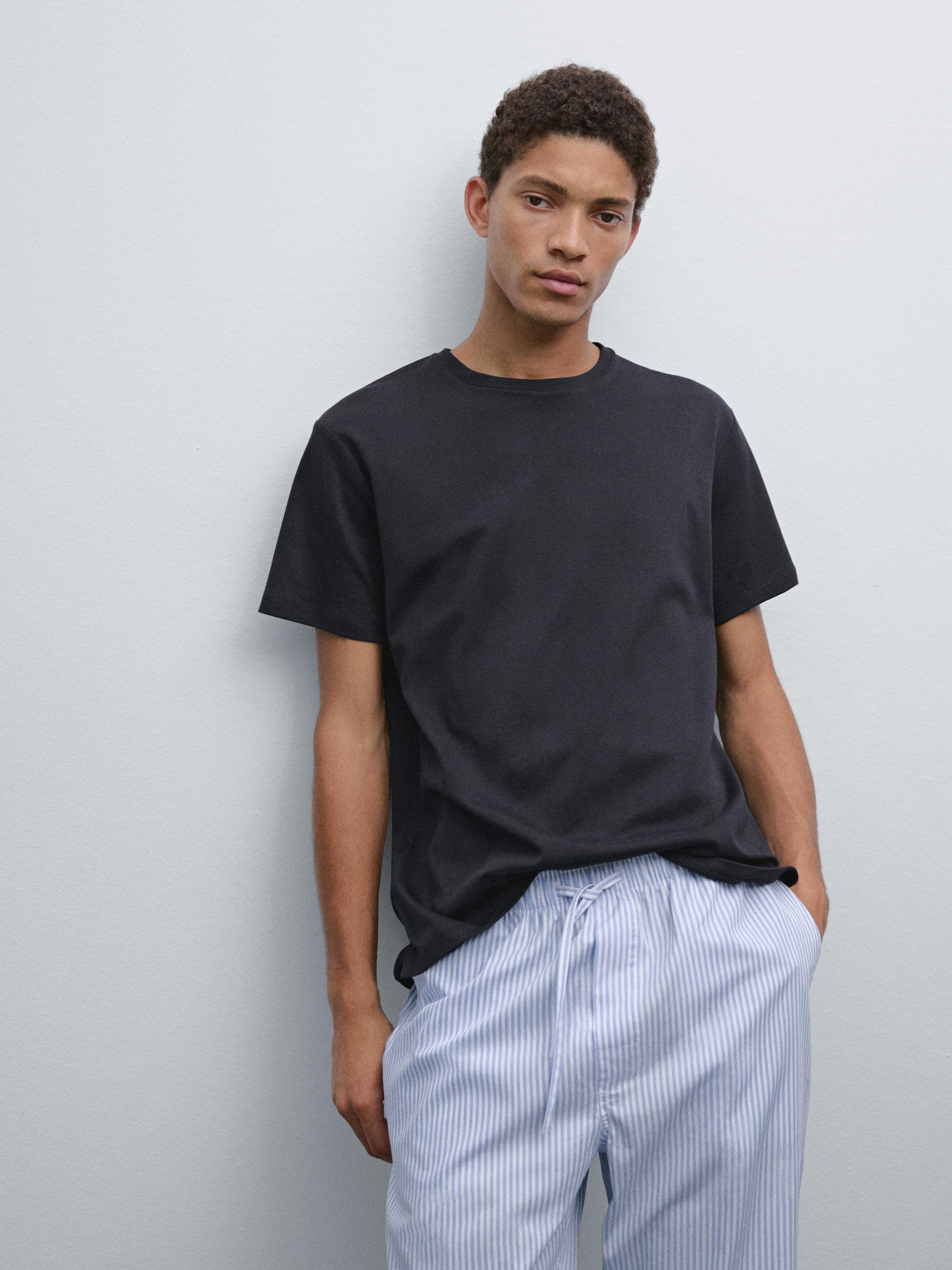 Short sleeve pyjama top and striped trousers