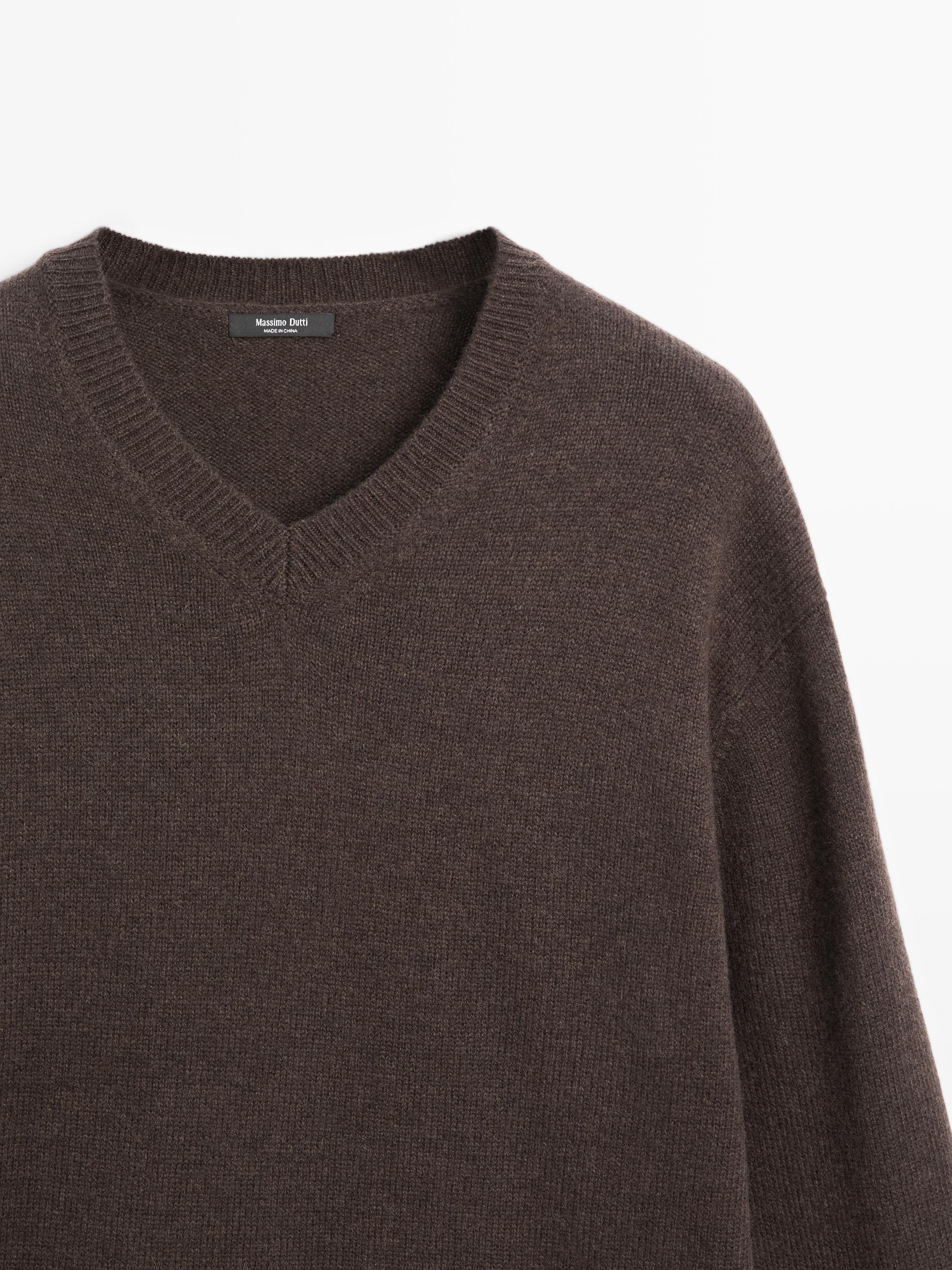Camisola oversize de malha com decote em bico
