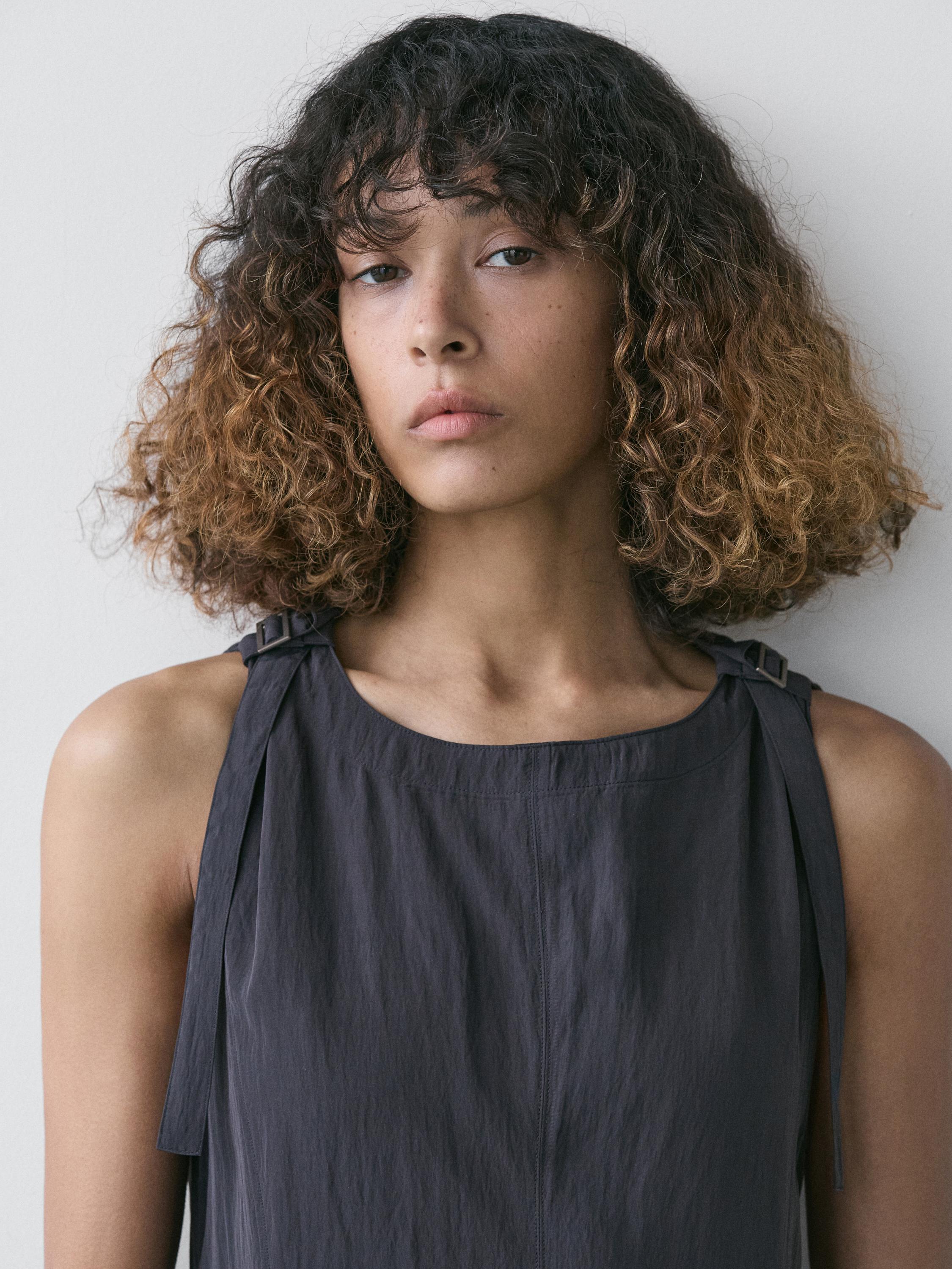 Flowing midi dress with buckles