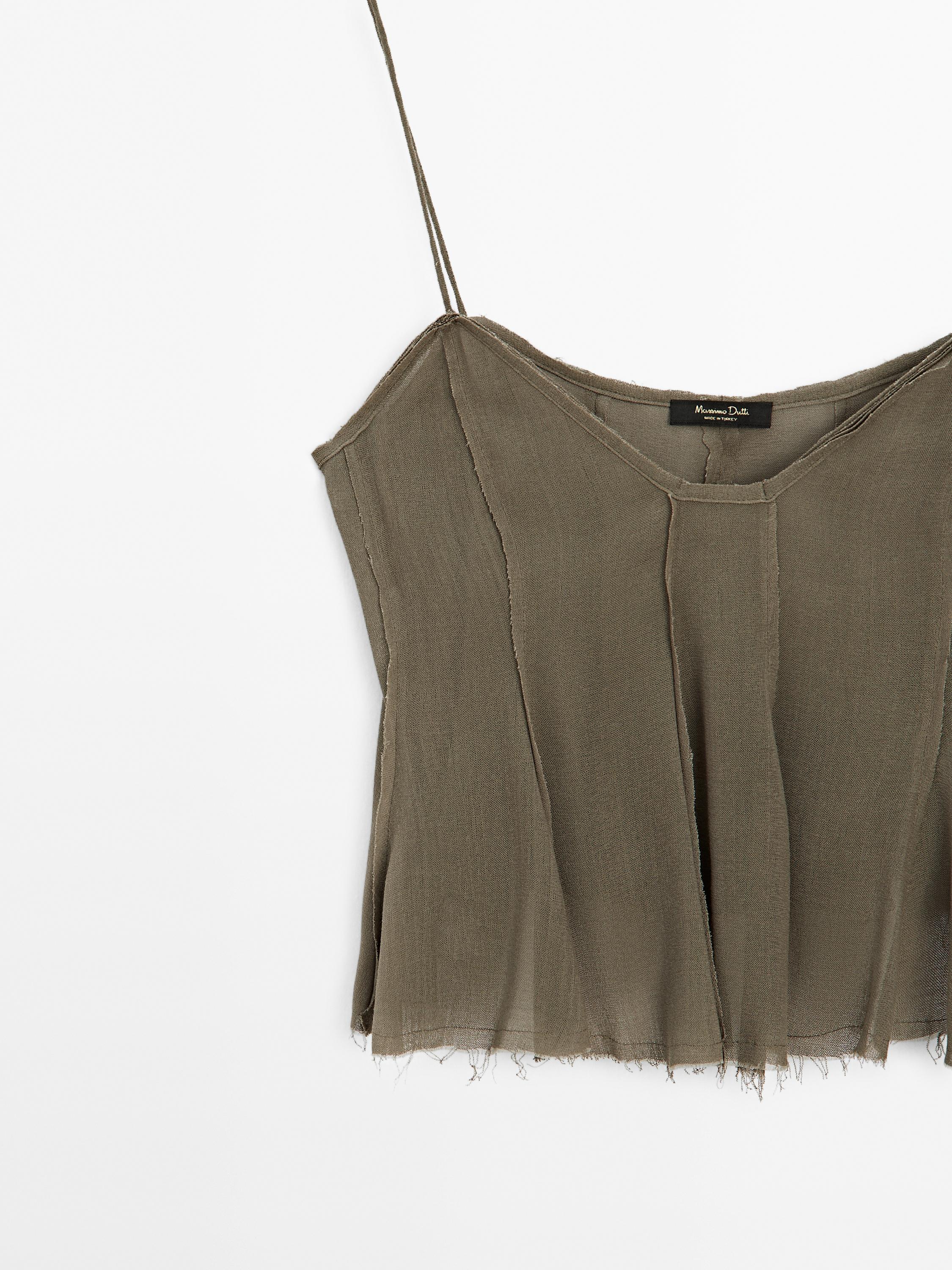 Flowing flared strappy top