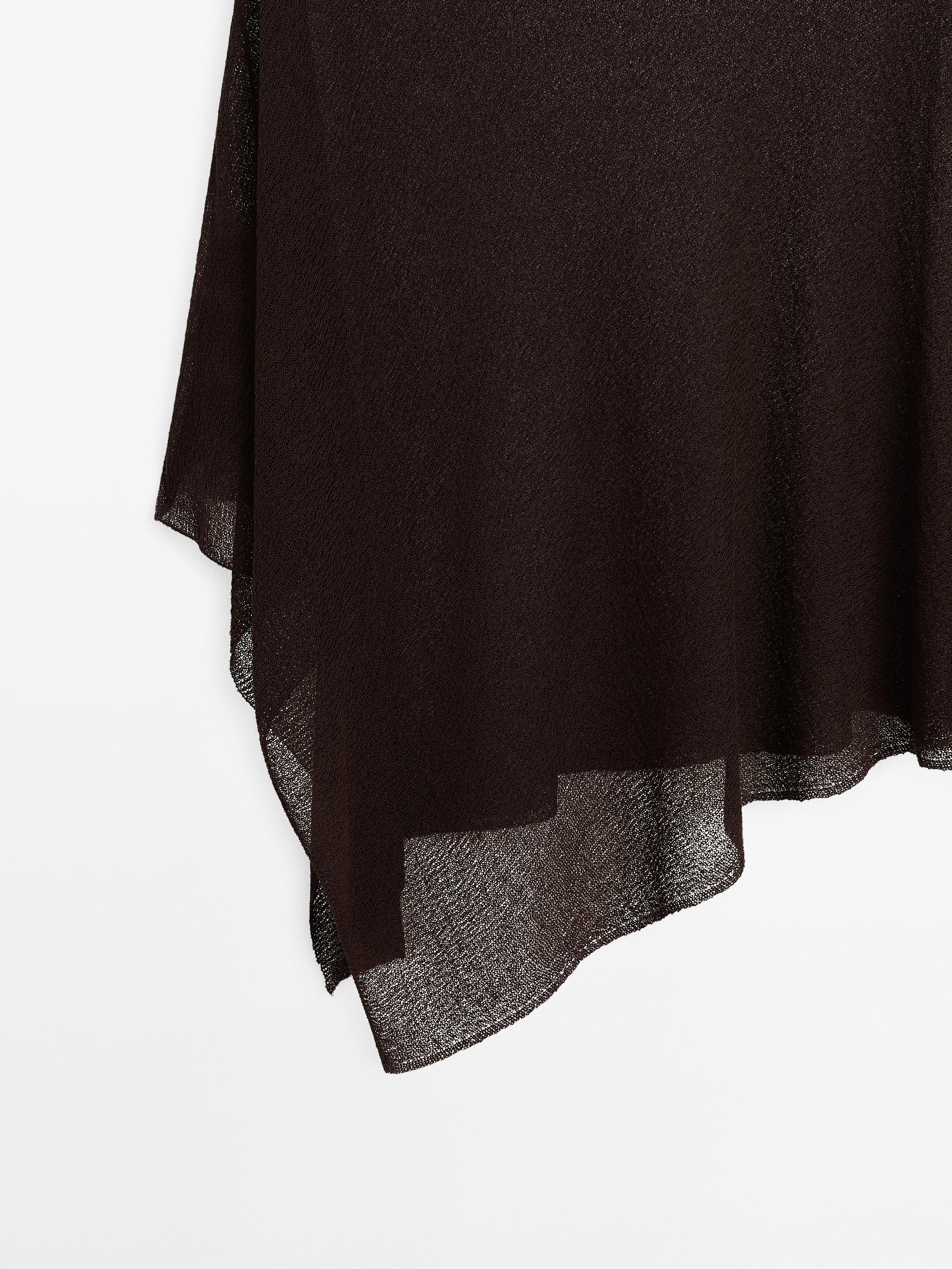 Asymmetric knit cape
