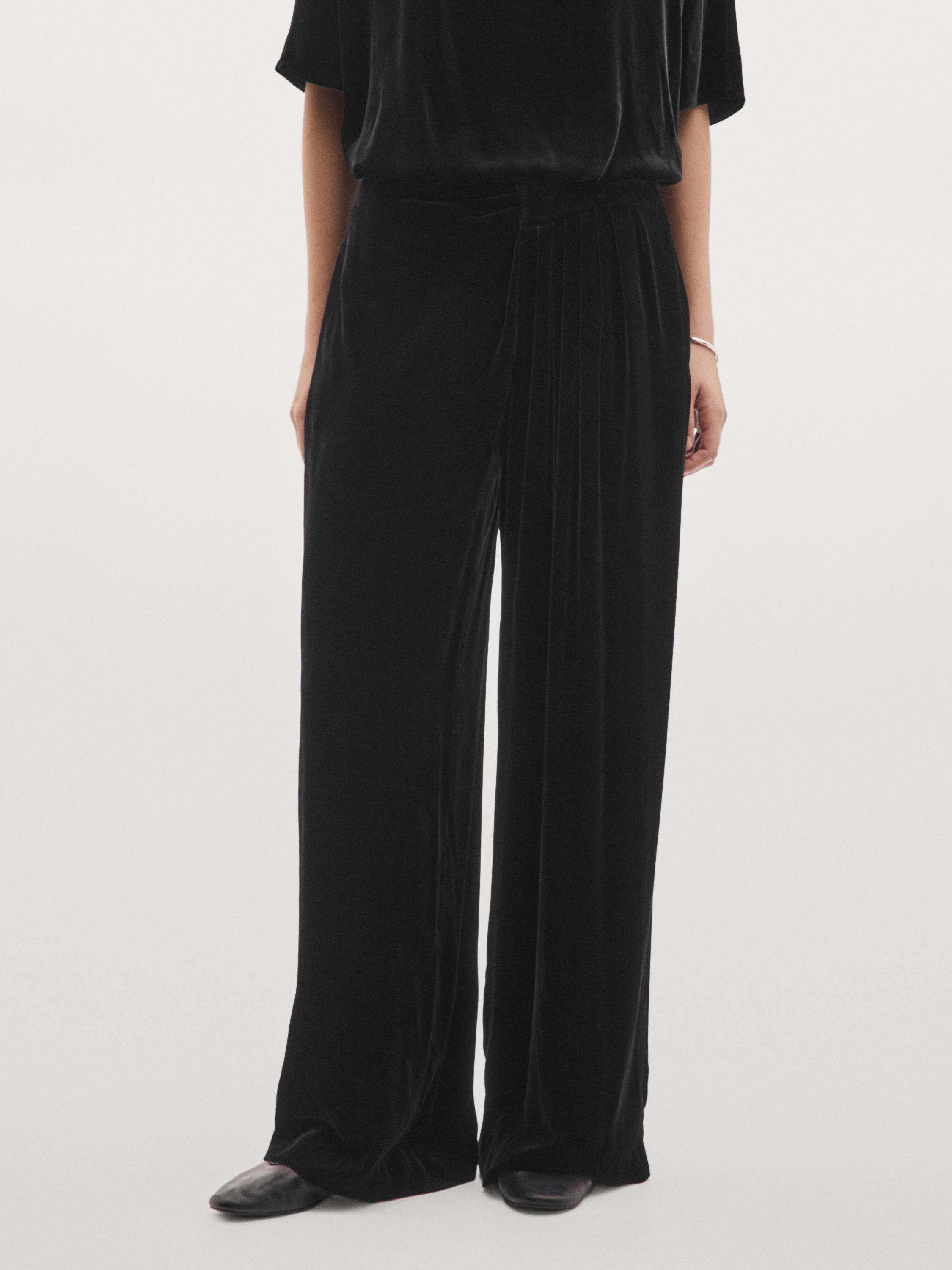 بنطلون مخملي بساق عريضة وثنيات