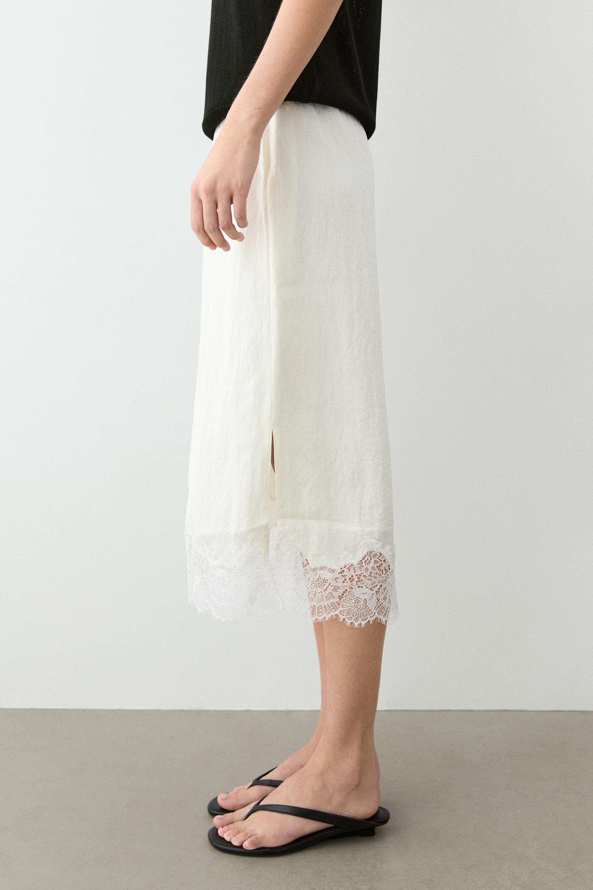 Flowing midi skirt with lace detail — WHITE