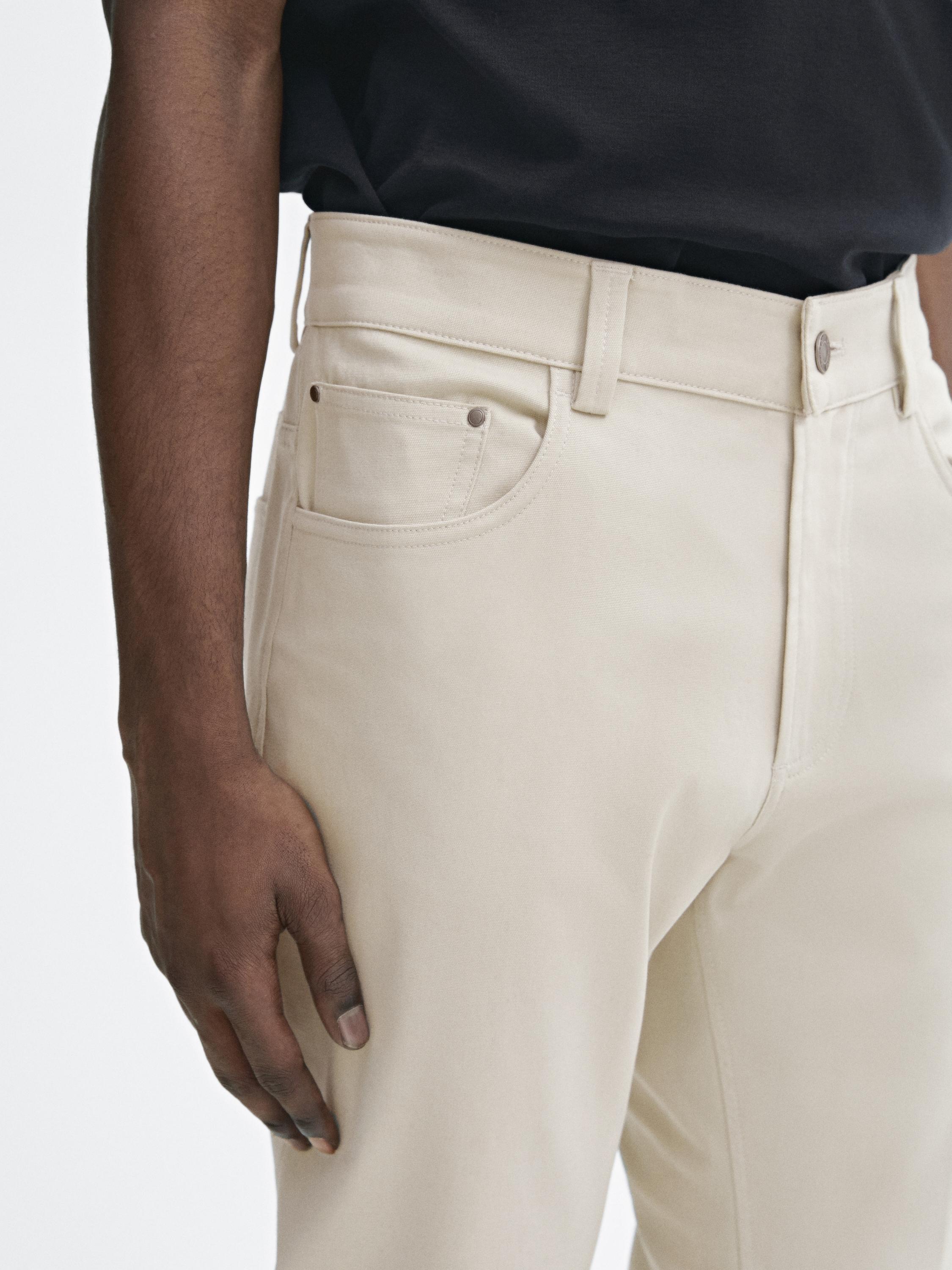 Cotton blend tapered fit jeans