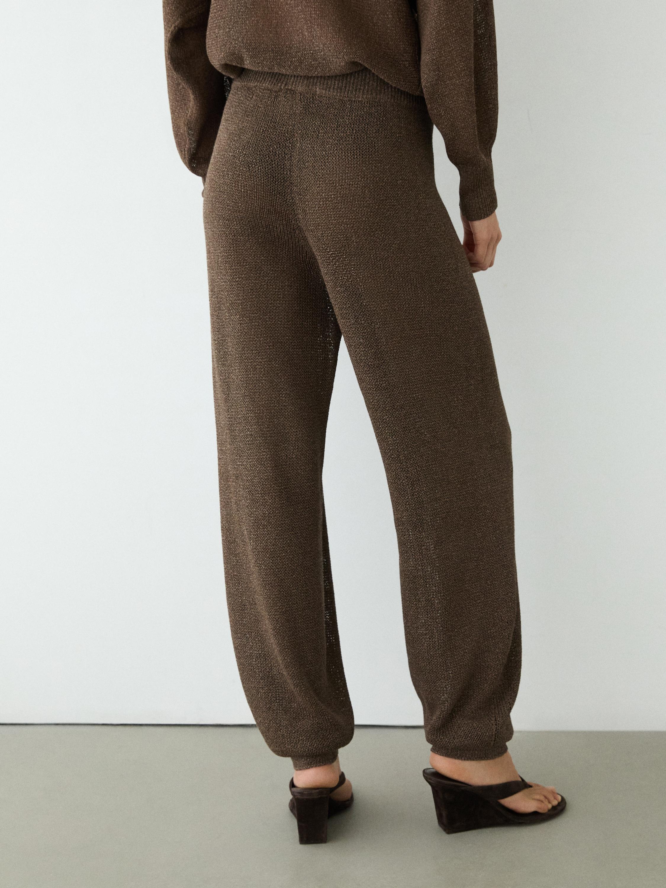 Total look balloon fit knit trousers — BROWN