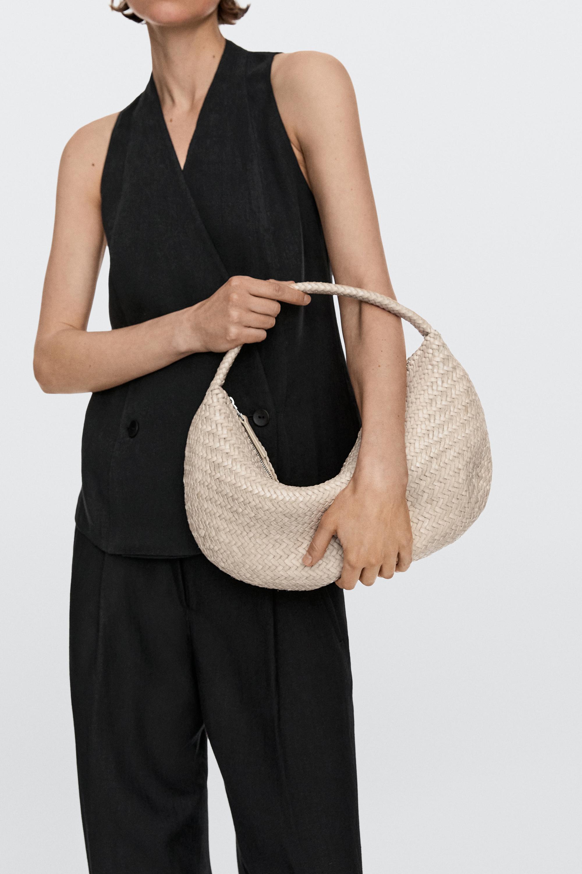 Braided leather half-moon bag — CREAM