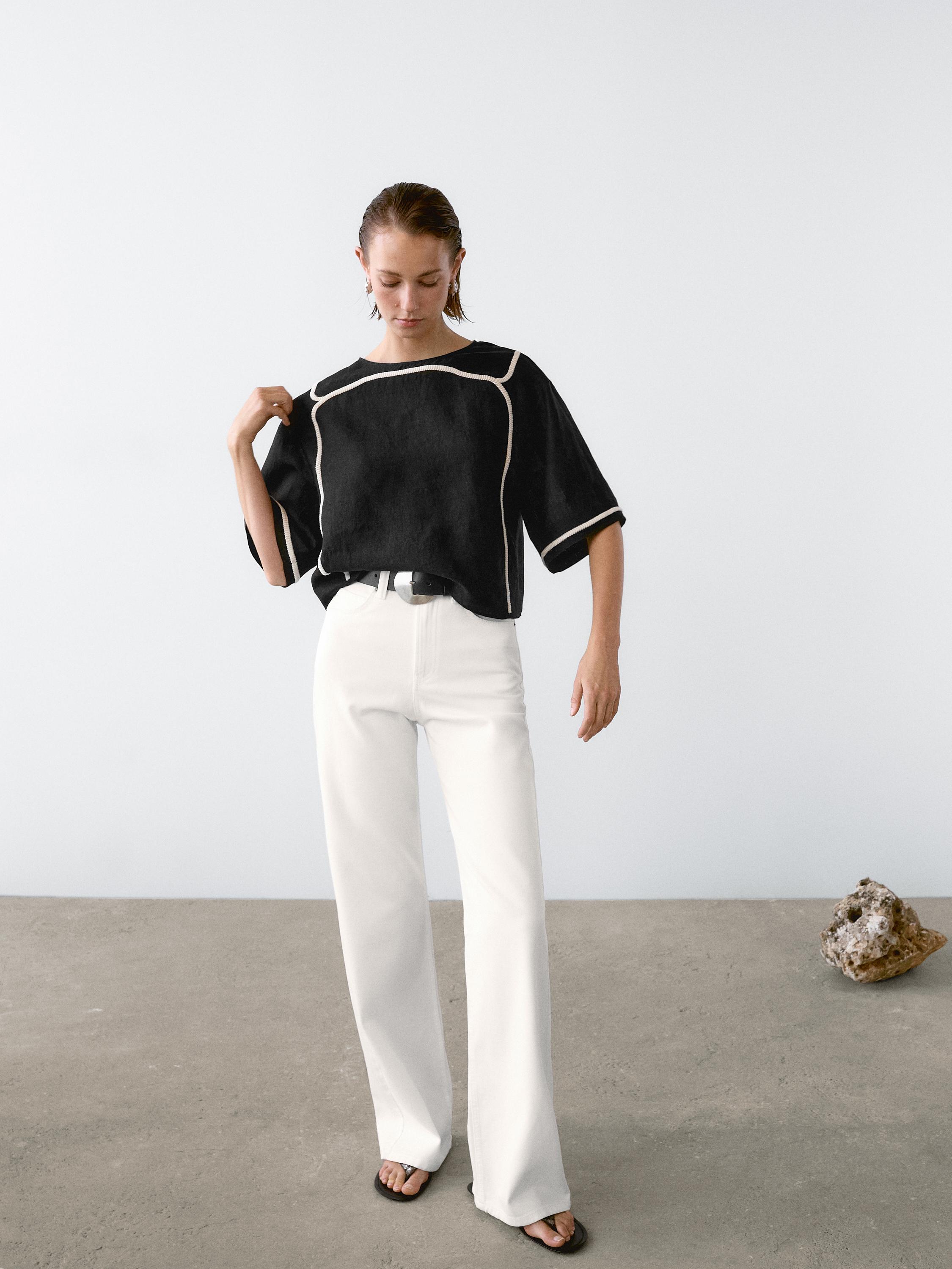 Blouse with contrast embroidery