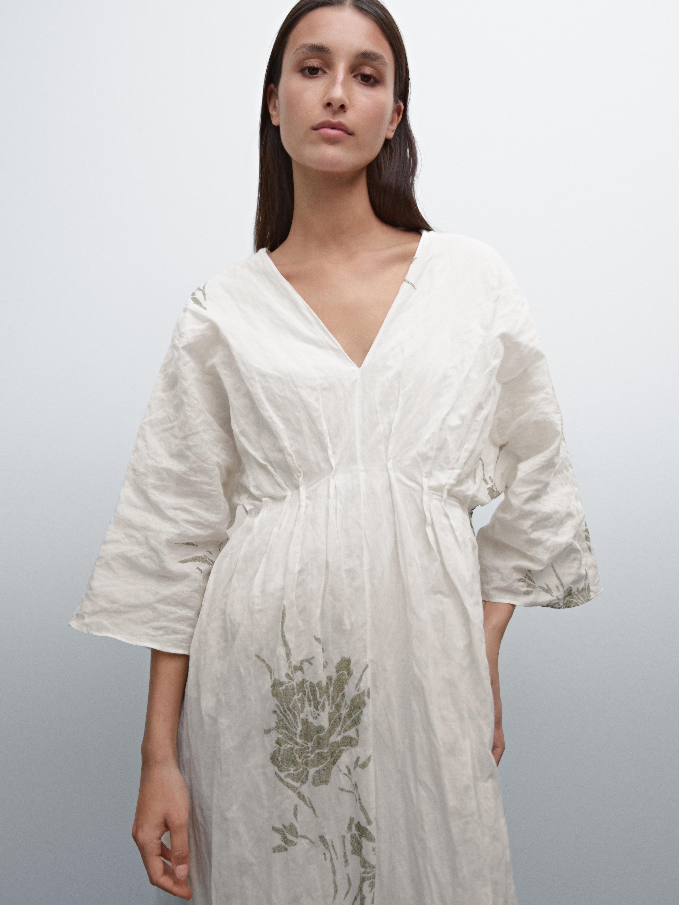 Dress with floral print fabric detail