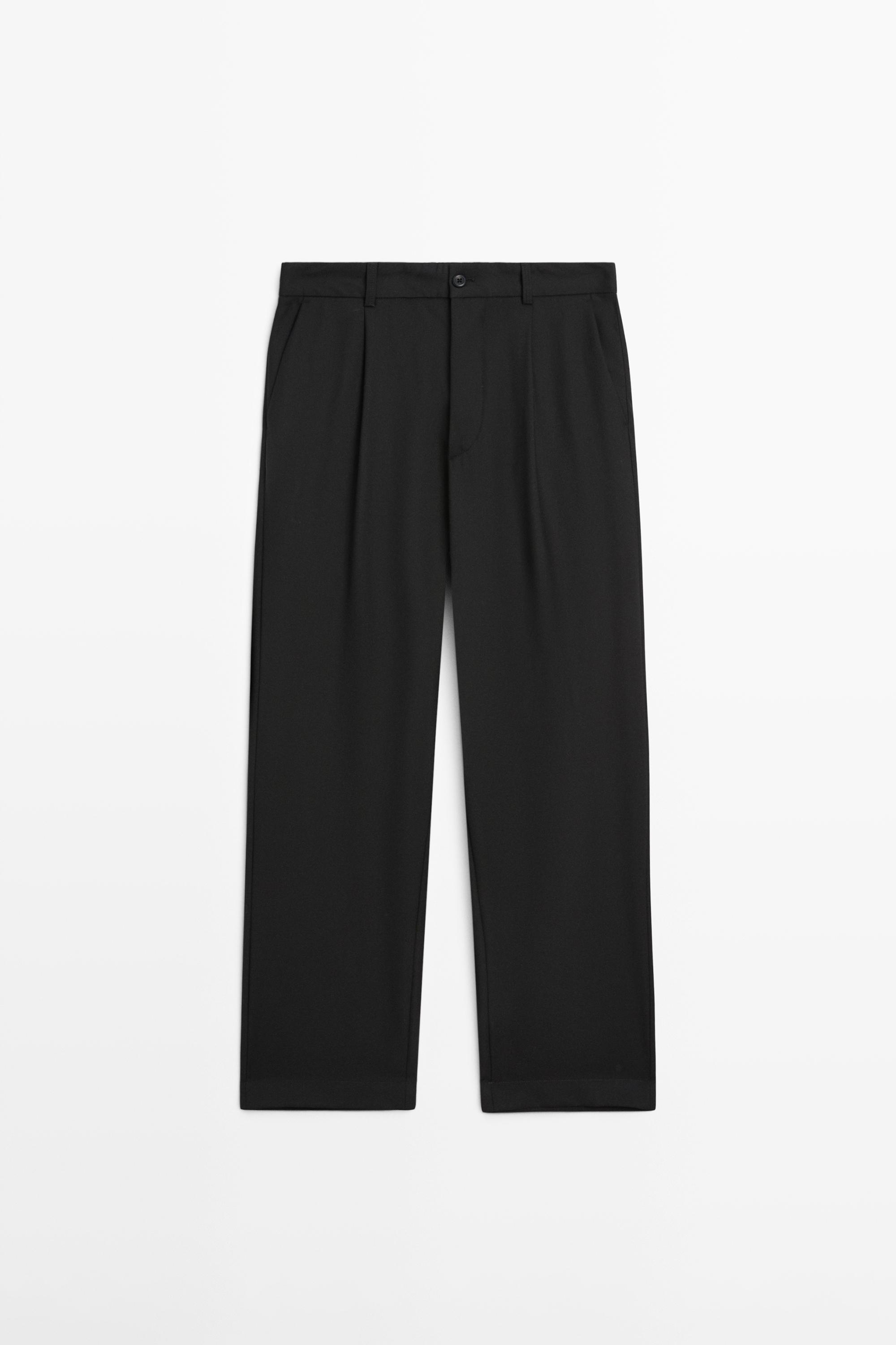 Calças relaxed fit com pinças de lã fria