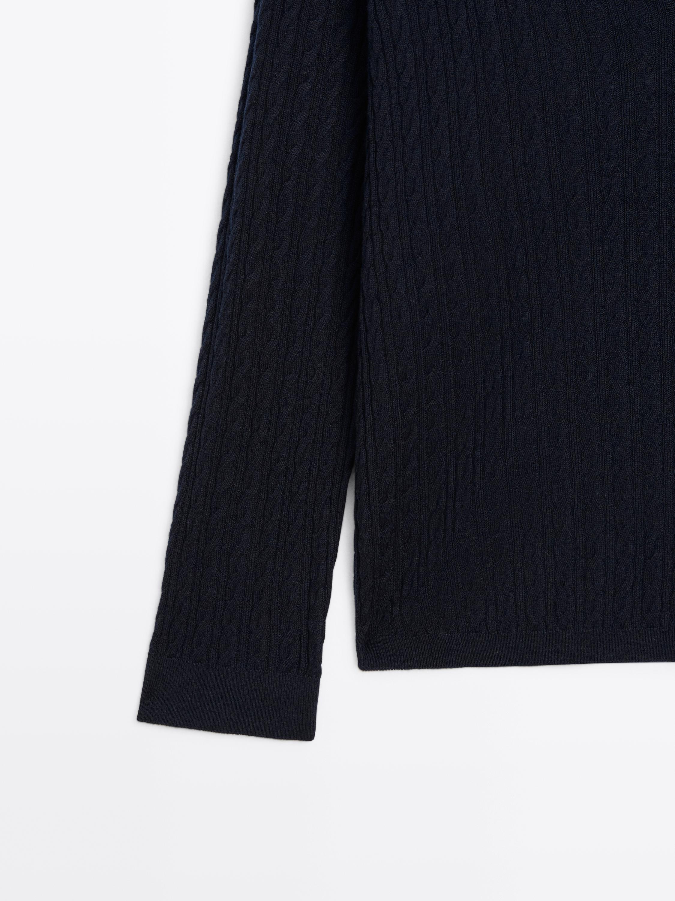 V-neck cable-knit sweater