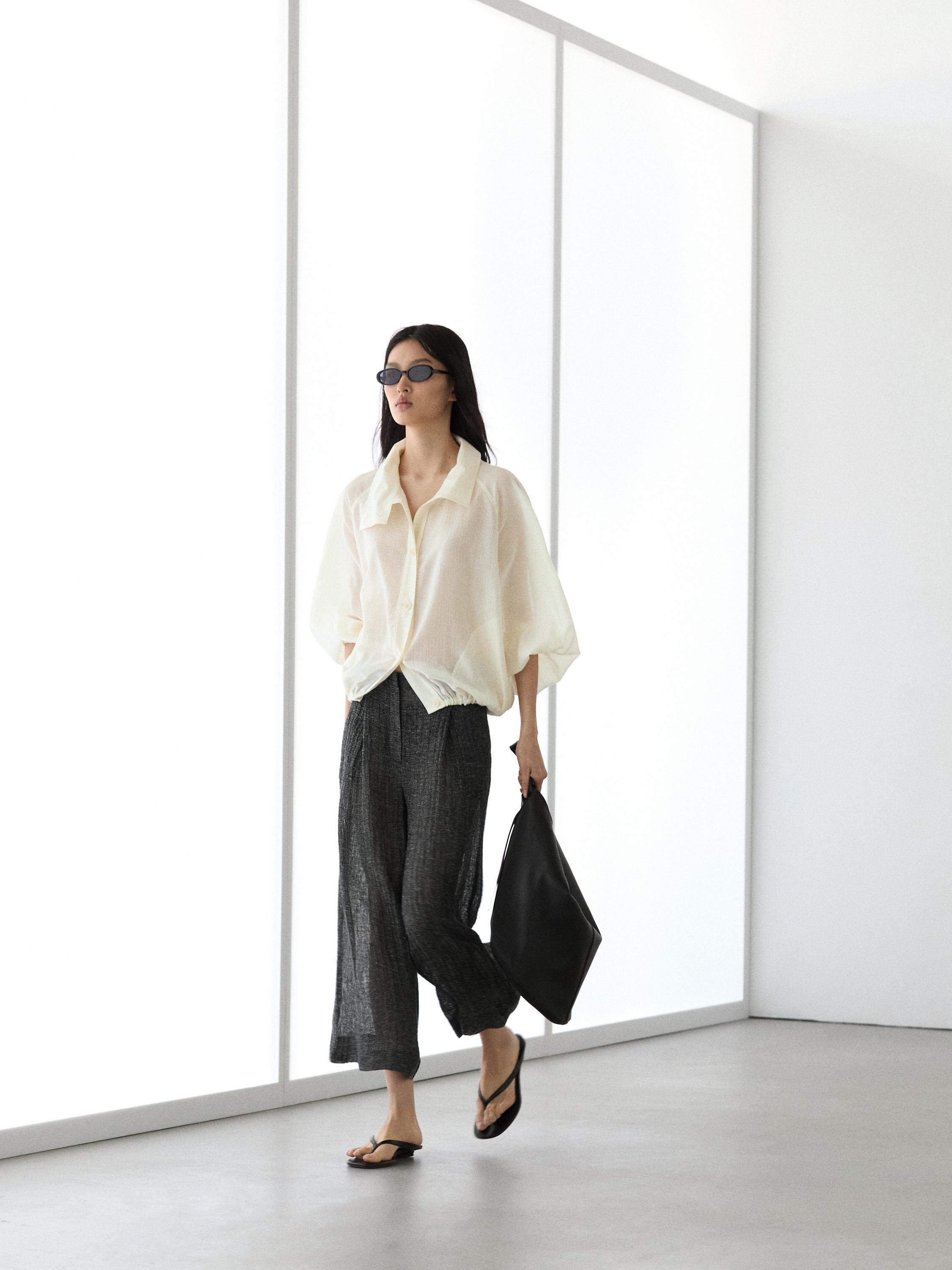 Calças com pinças em linho "total look" melange