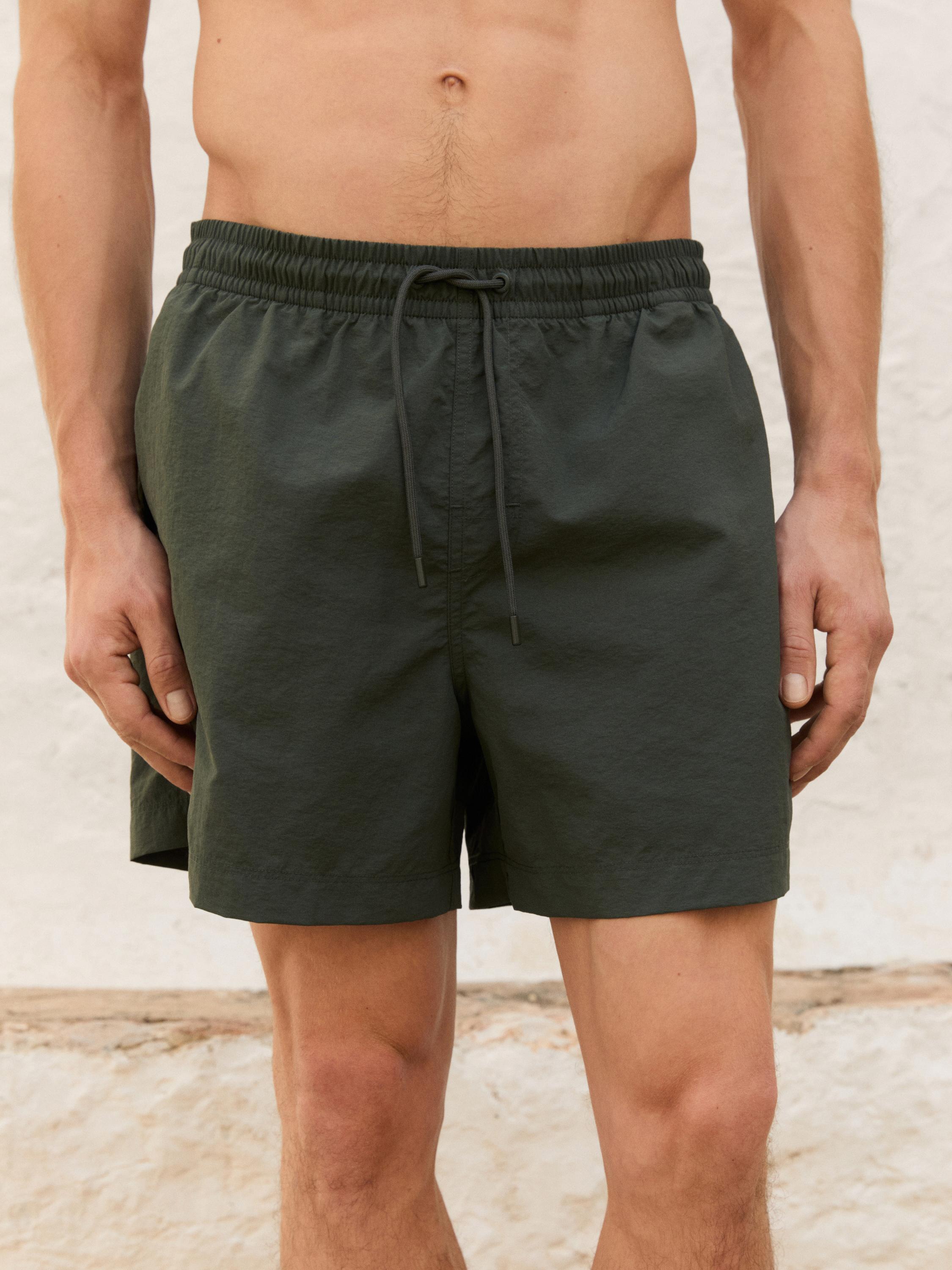 Plain short fit swimming trunks