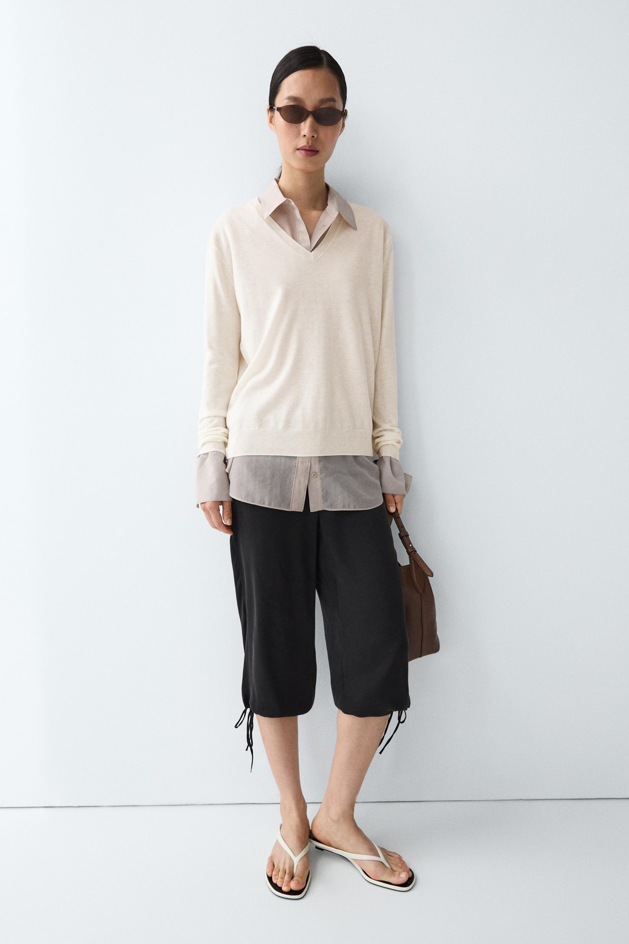 V-neck knit sweater — CREAM