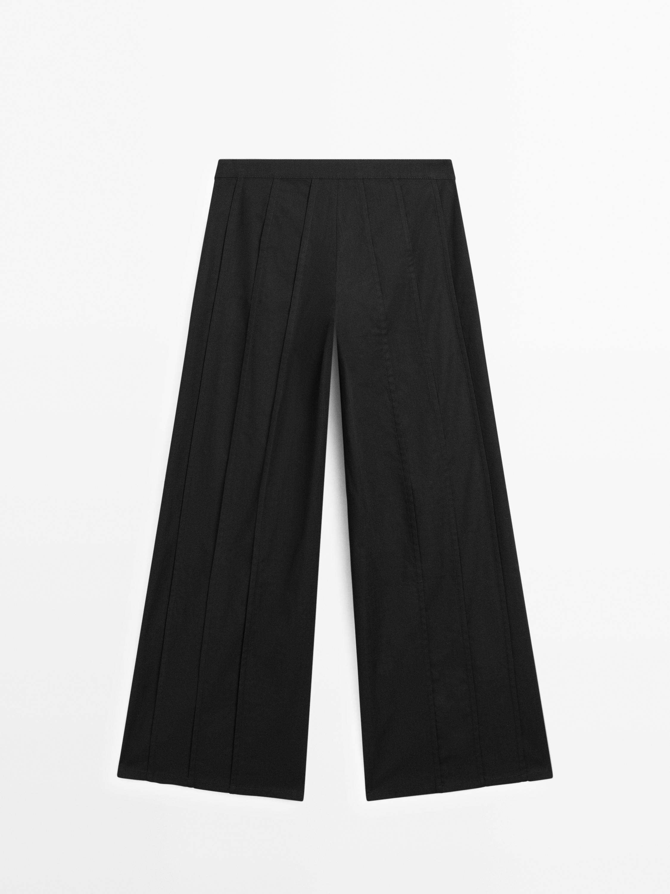 Wide-leg trousers with seam details