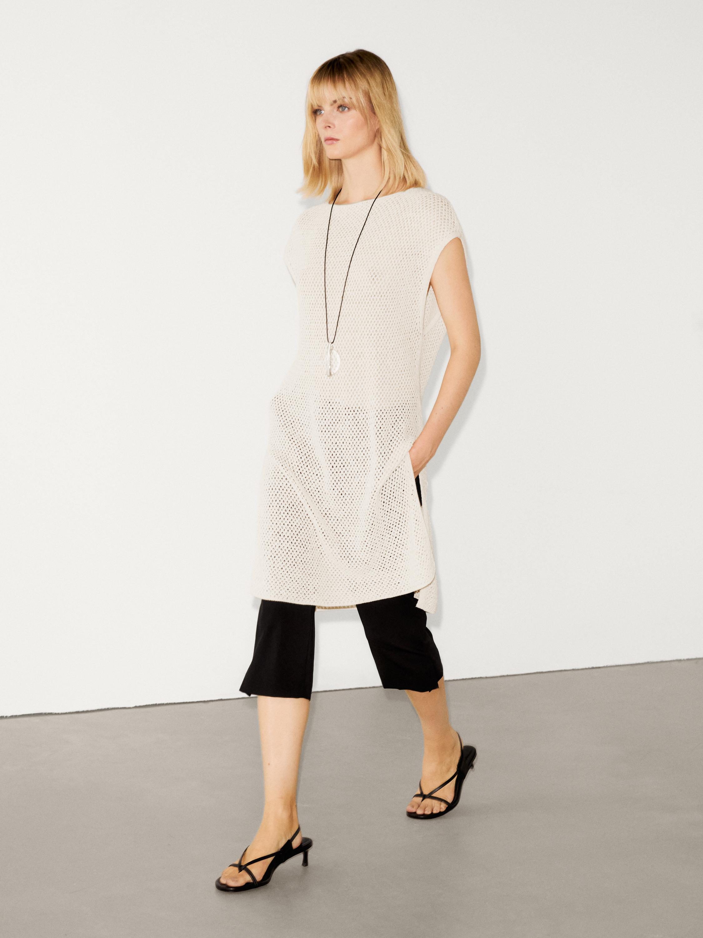 Knit vest with vent details