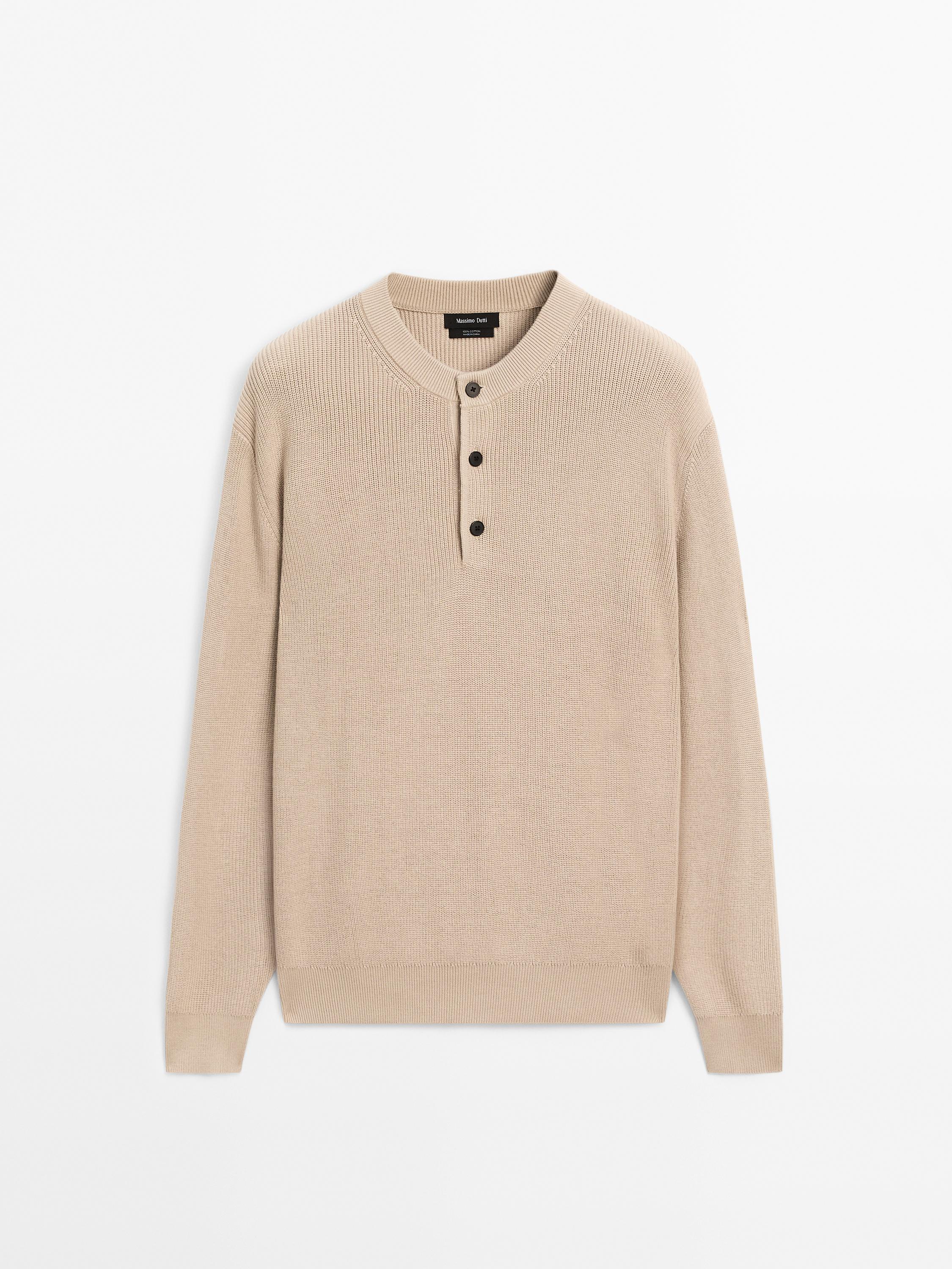 Cotton knit sweater with buttoned neck