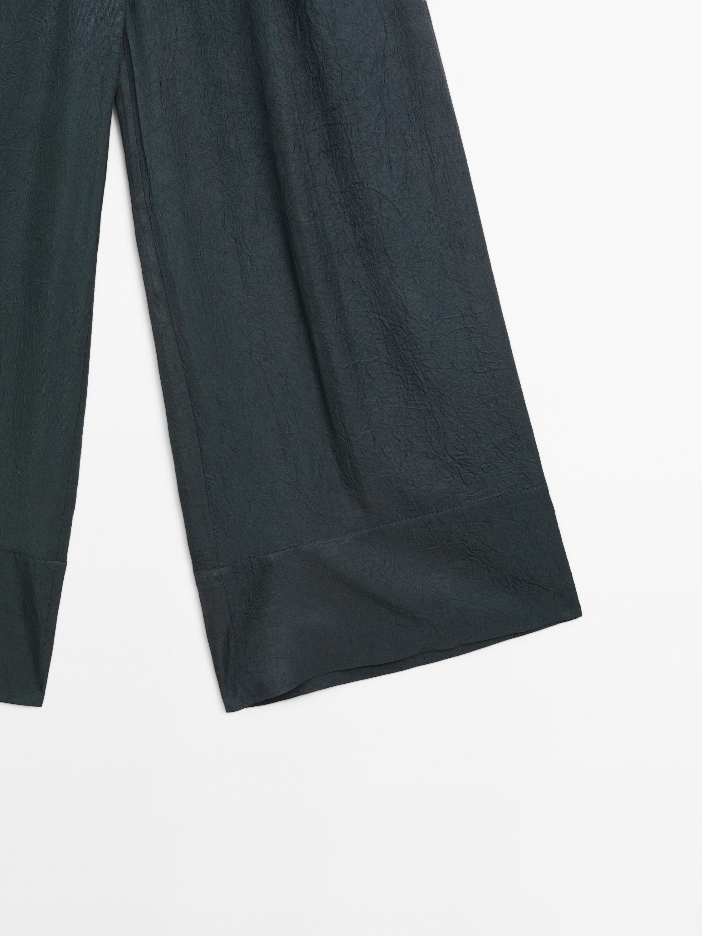 Pantalón fluido efecto arrugado