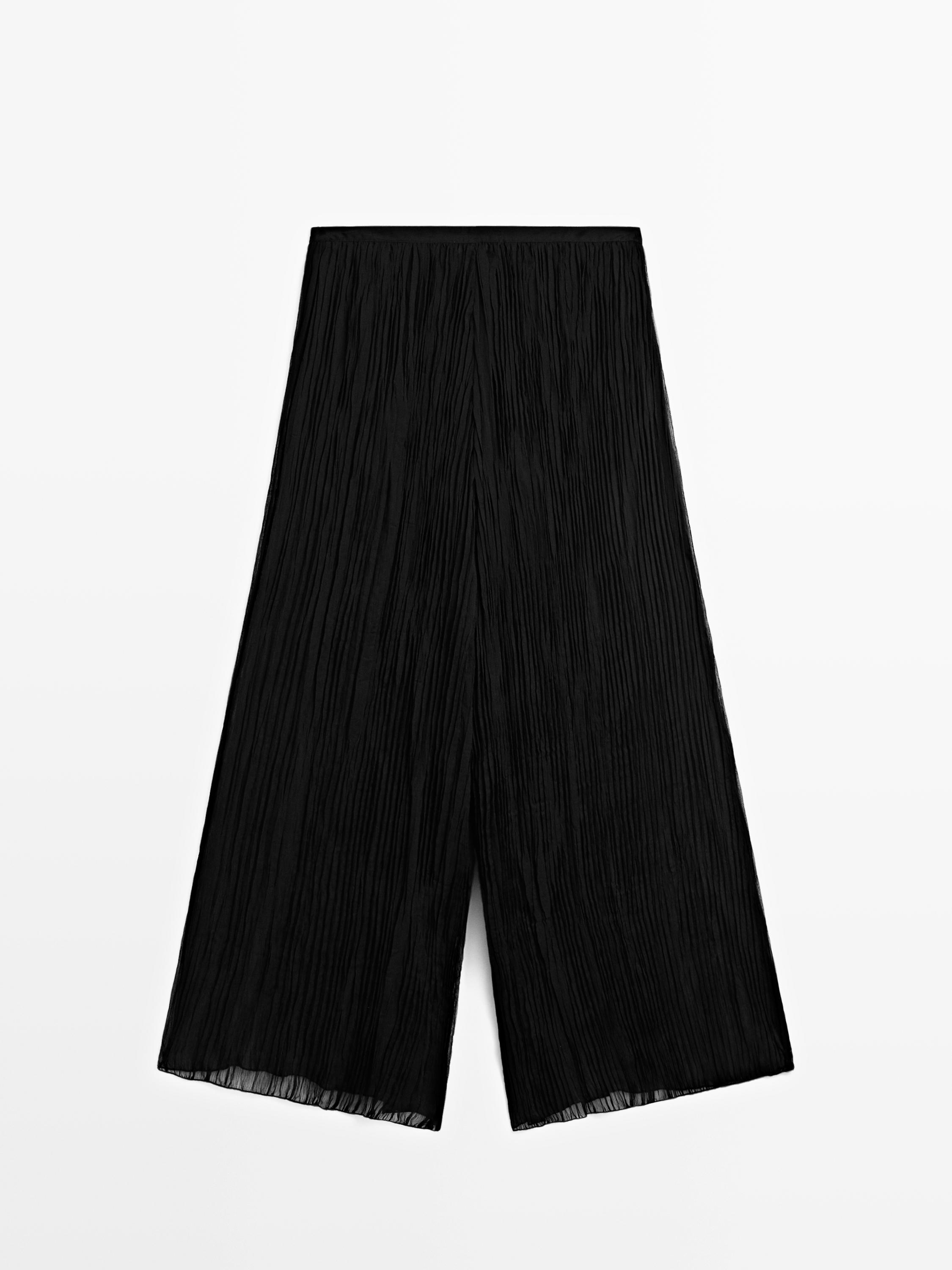 Pantalón ancho plisado