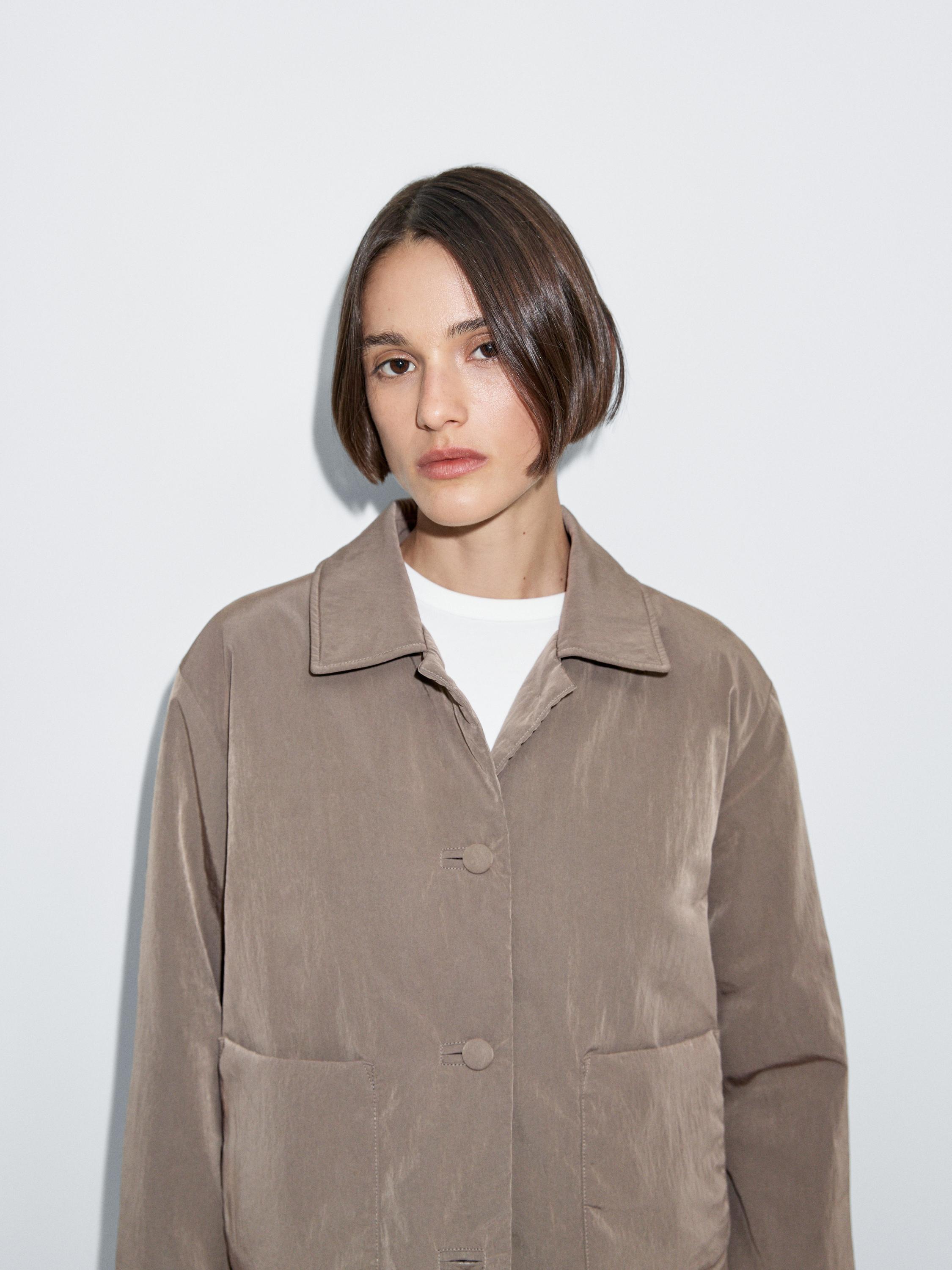 Cropped puffer jacket with covered buttons