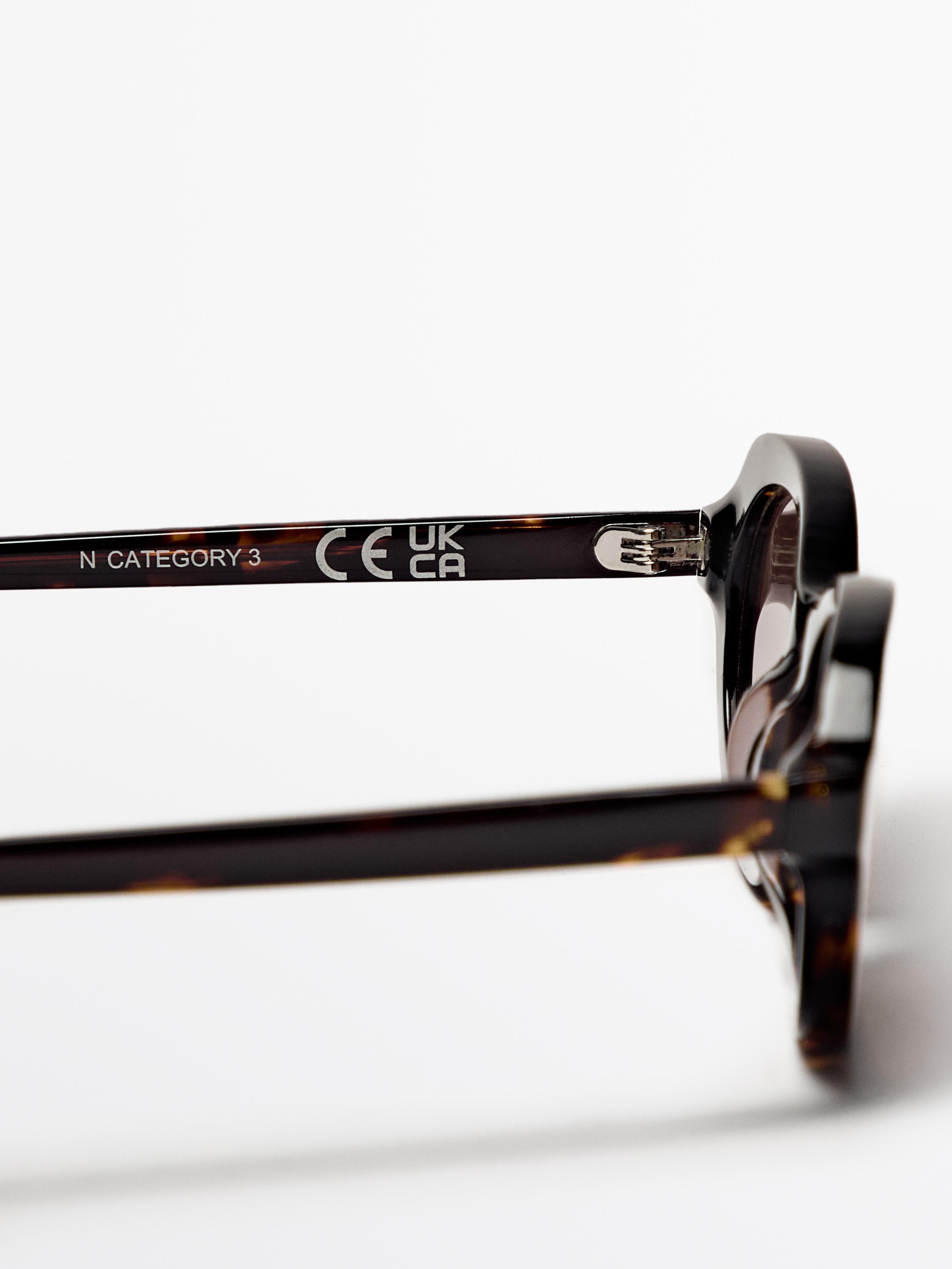 Tortoiseshell-effect mini oval sunglasses