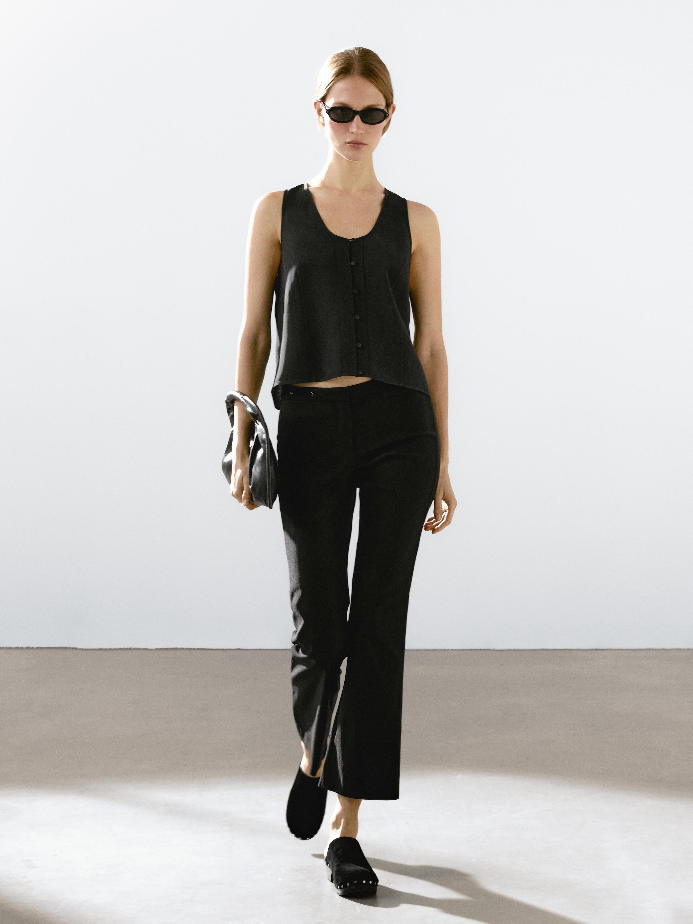 Top abotonado pespunte pechera