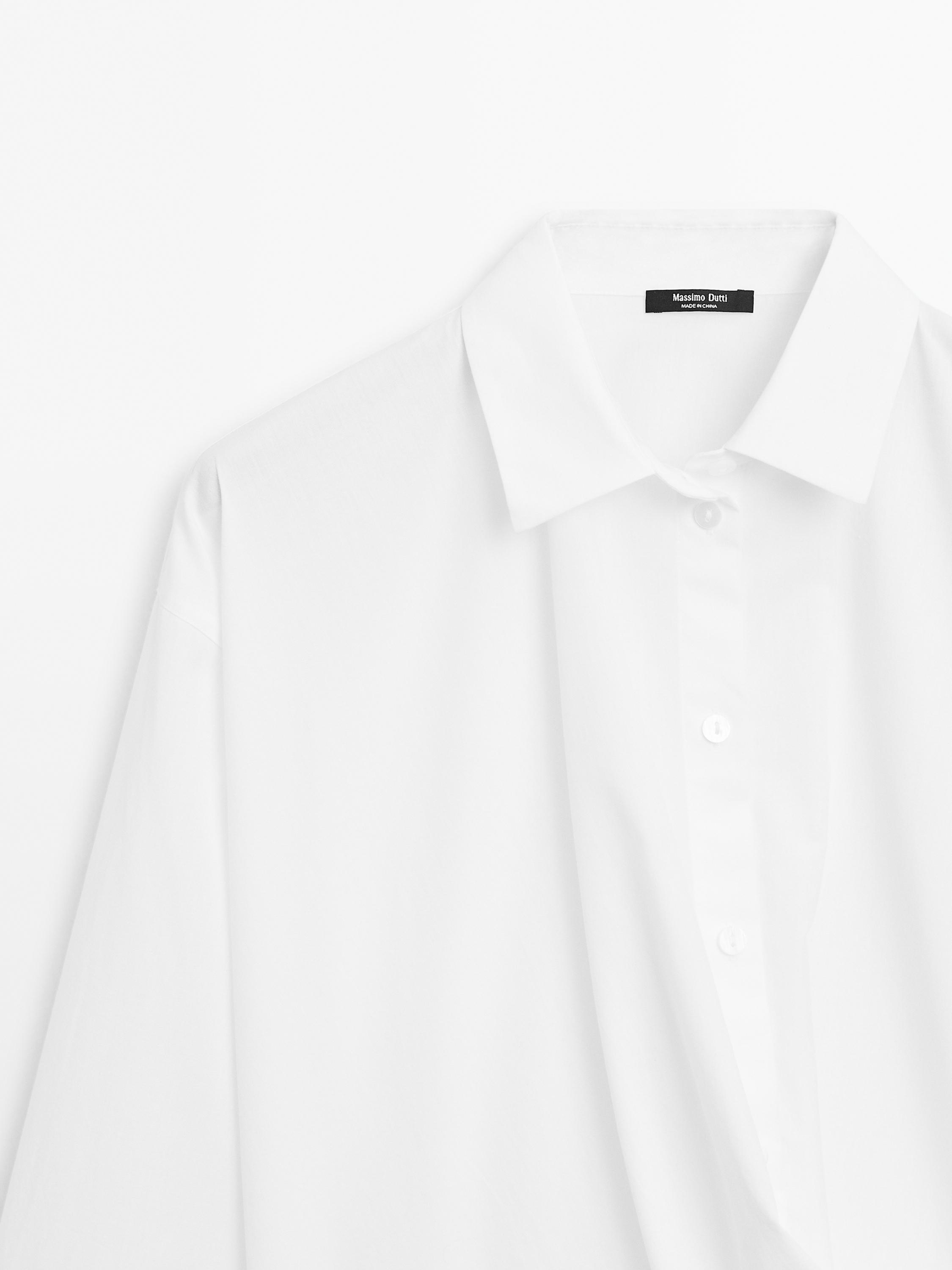 100% cotton shirt with draped asymmetric hem