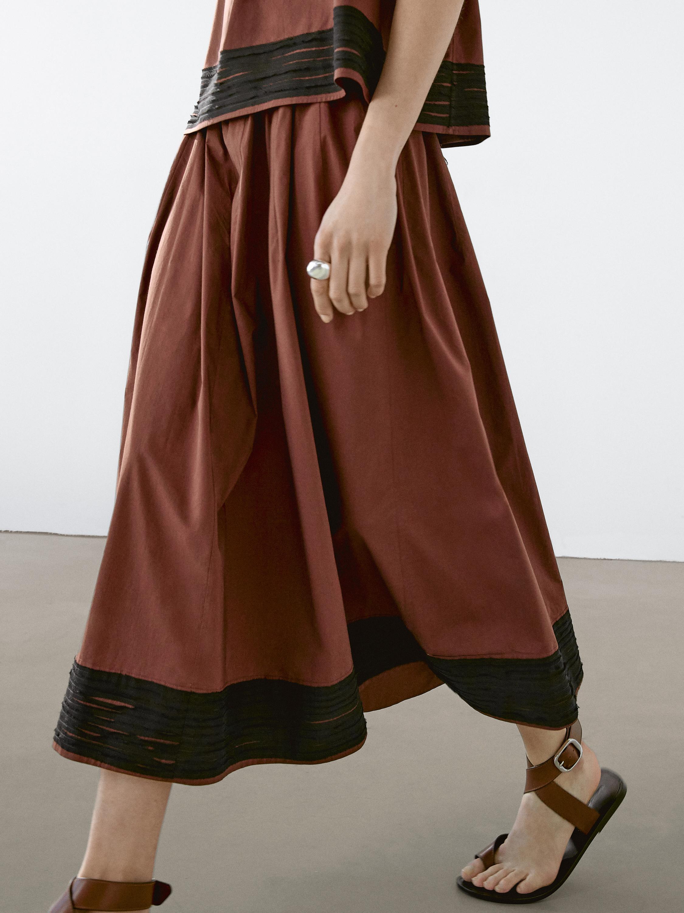 Jupe midi ample avec bandes