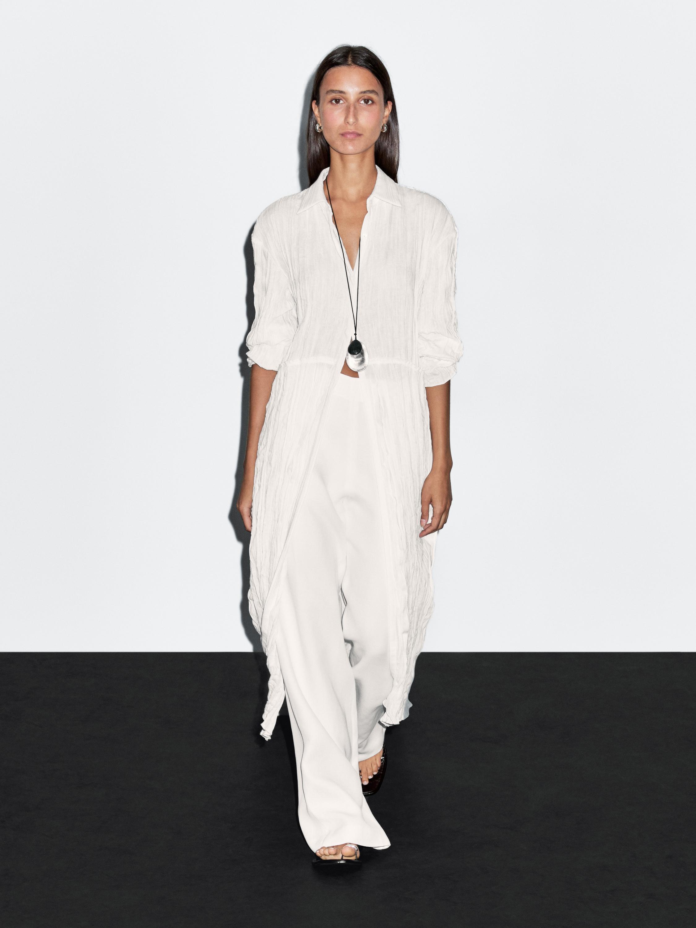 بلوزة بليسيه طويلة فضفاضة