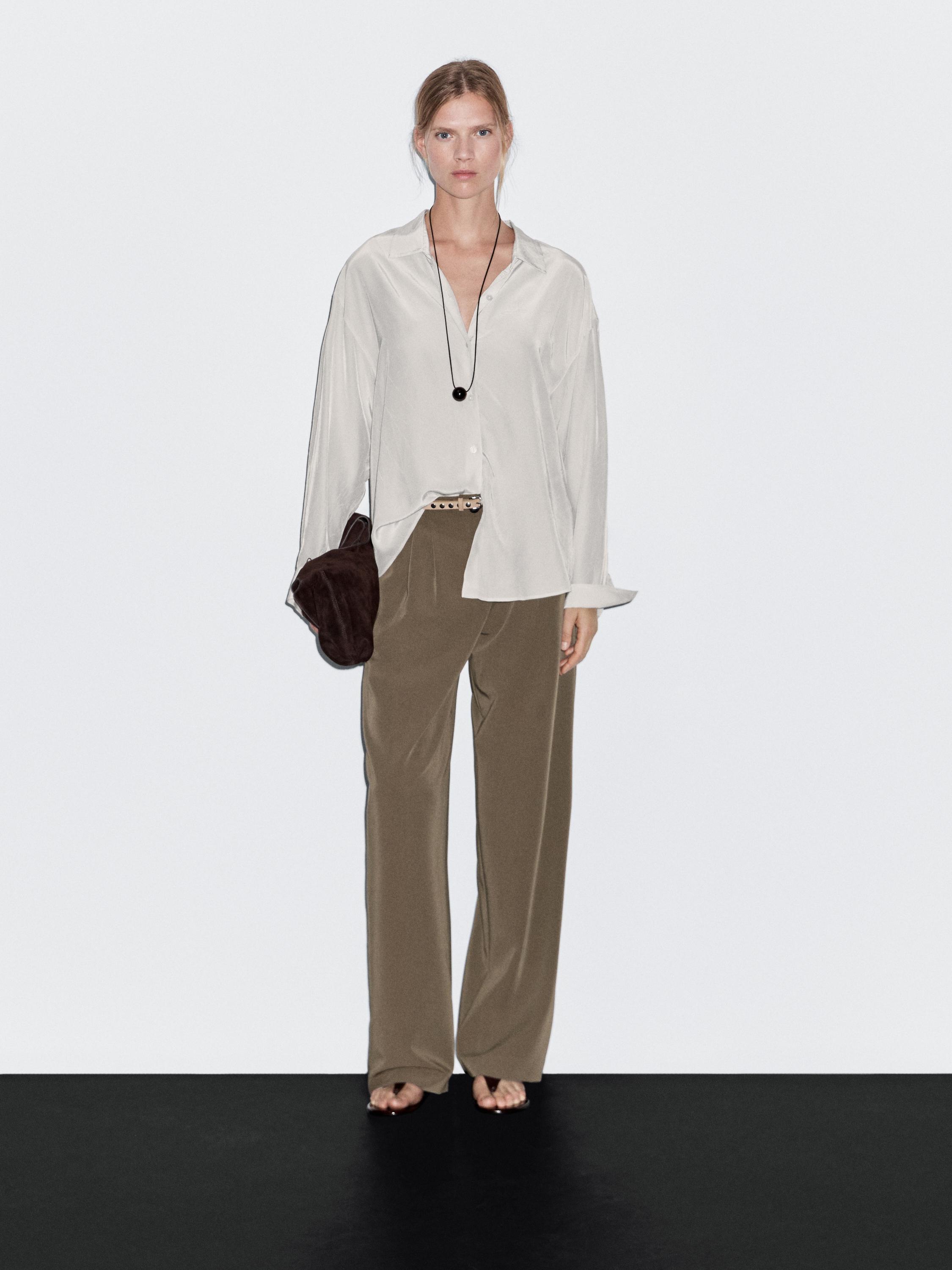 Wide-leg flowing trousers with darts