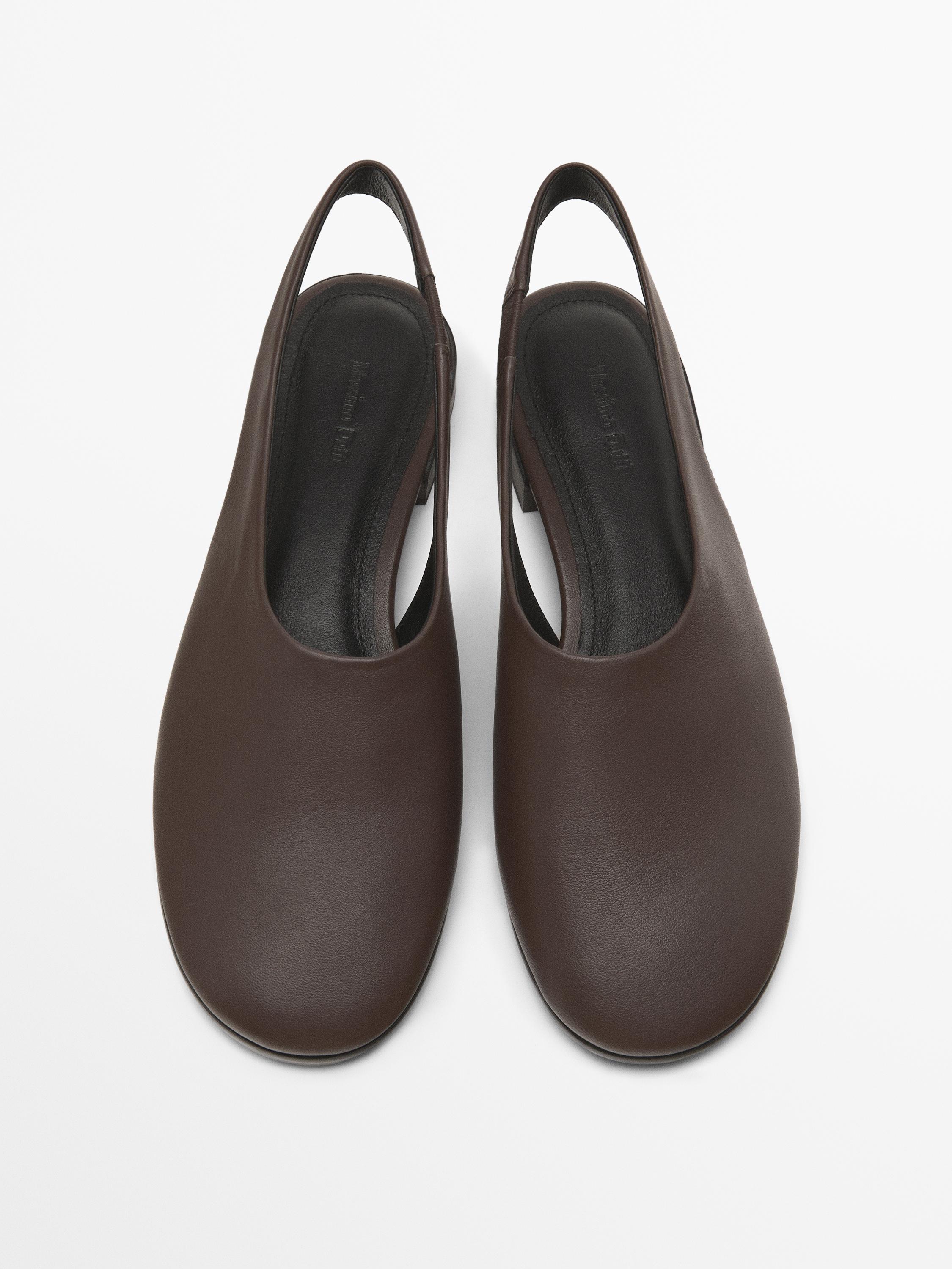 حذاء مسطح مثقب بسير للكاحل