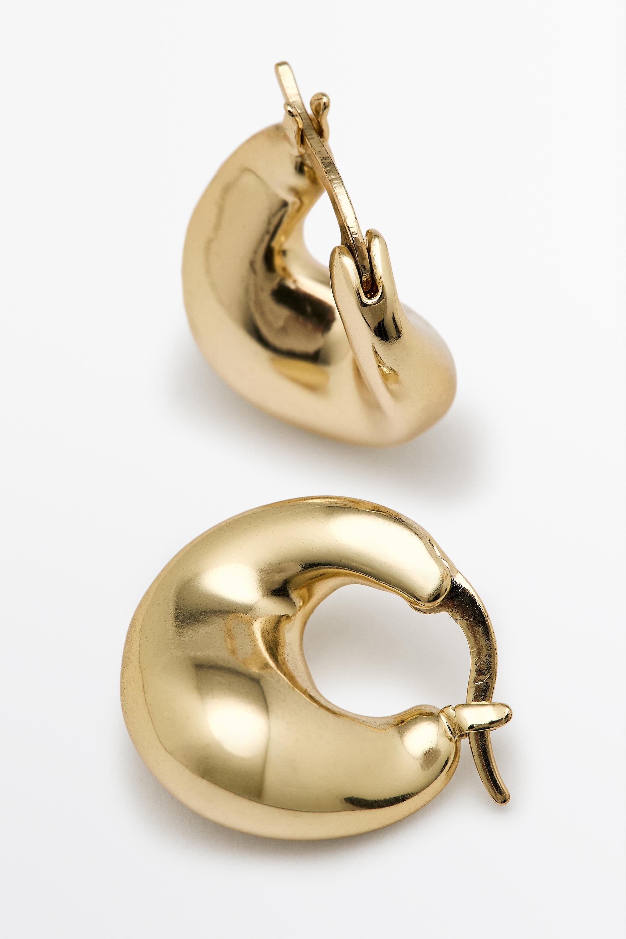Voluminous hoop earrings — GOLDEN