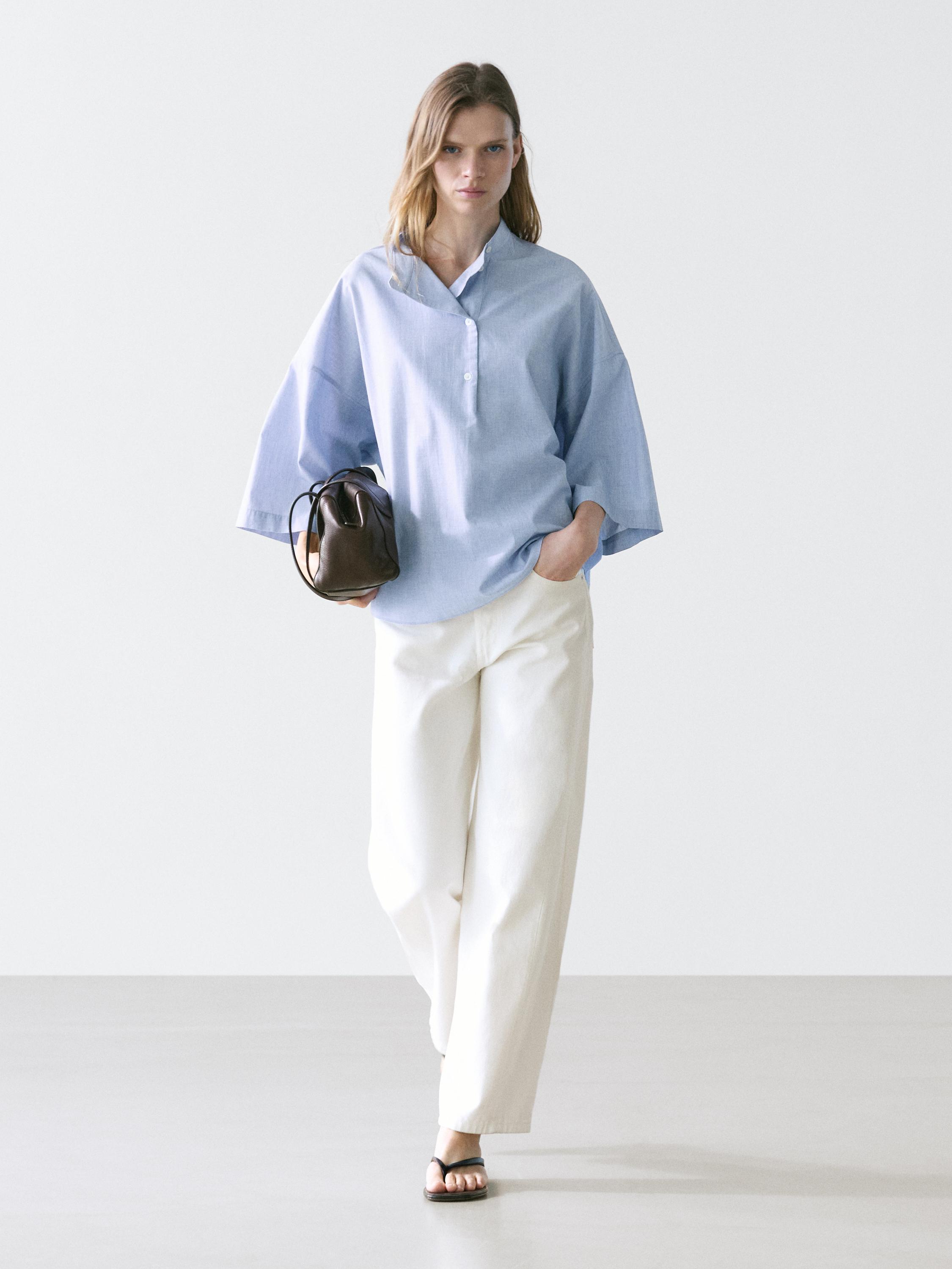 Flowing blouse with buttoned collar detail — Denim blue
