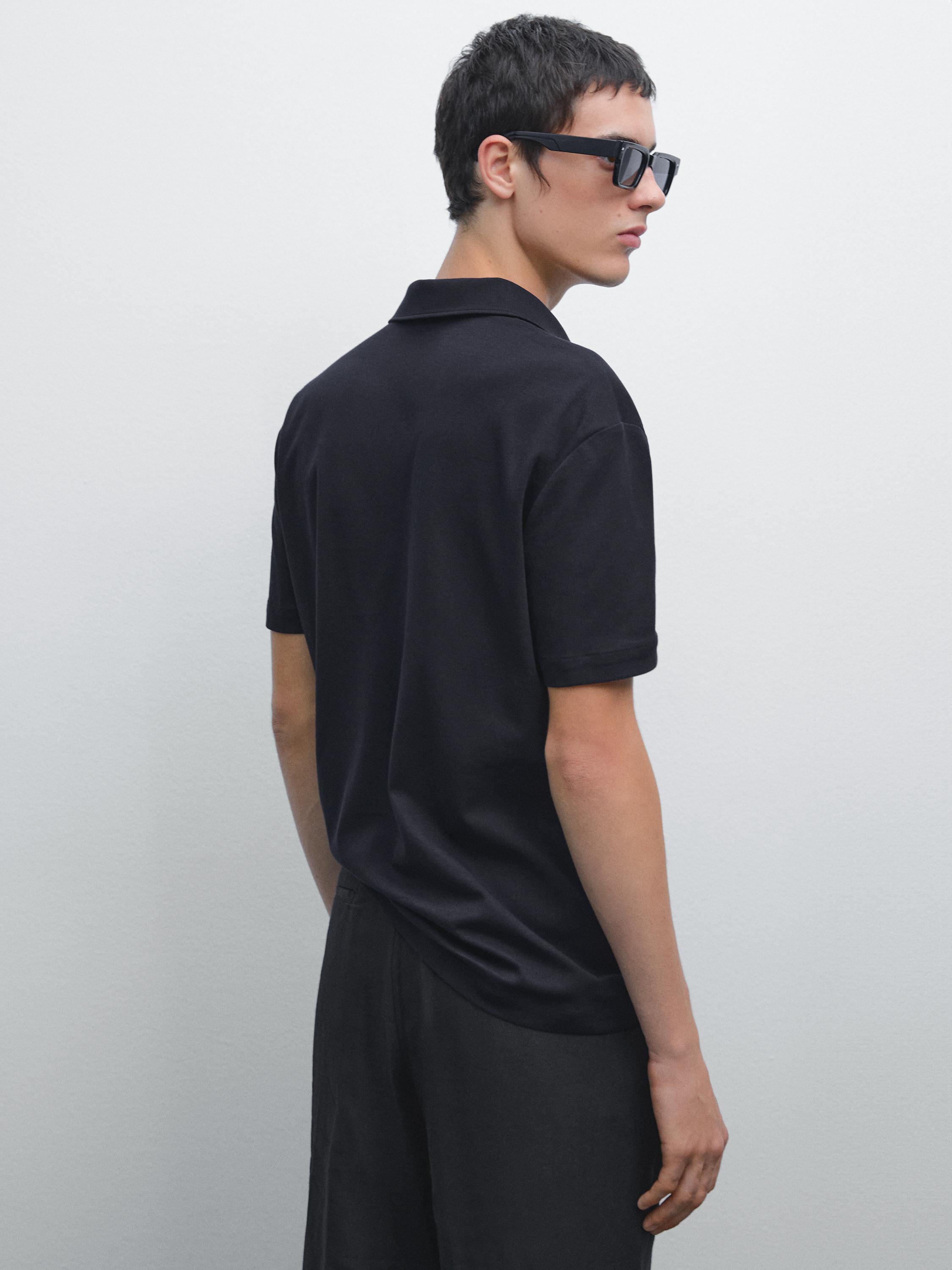 Short sleeve polo shirt with snap-button placket