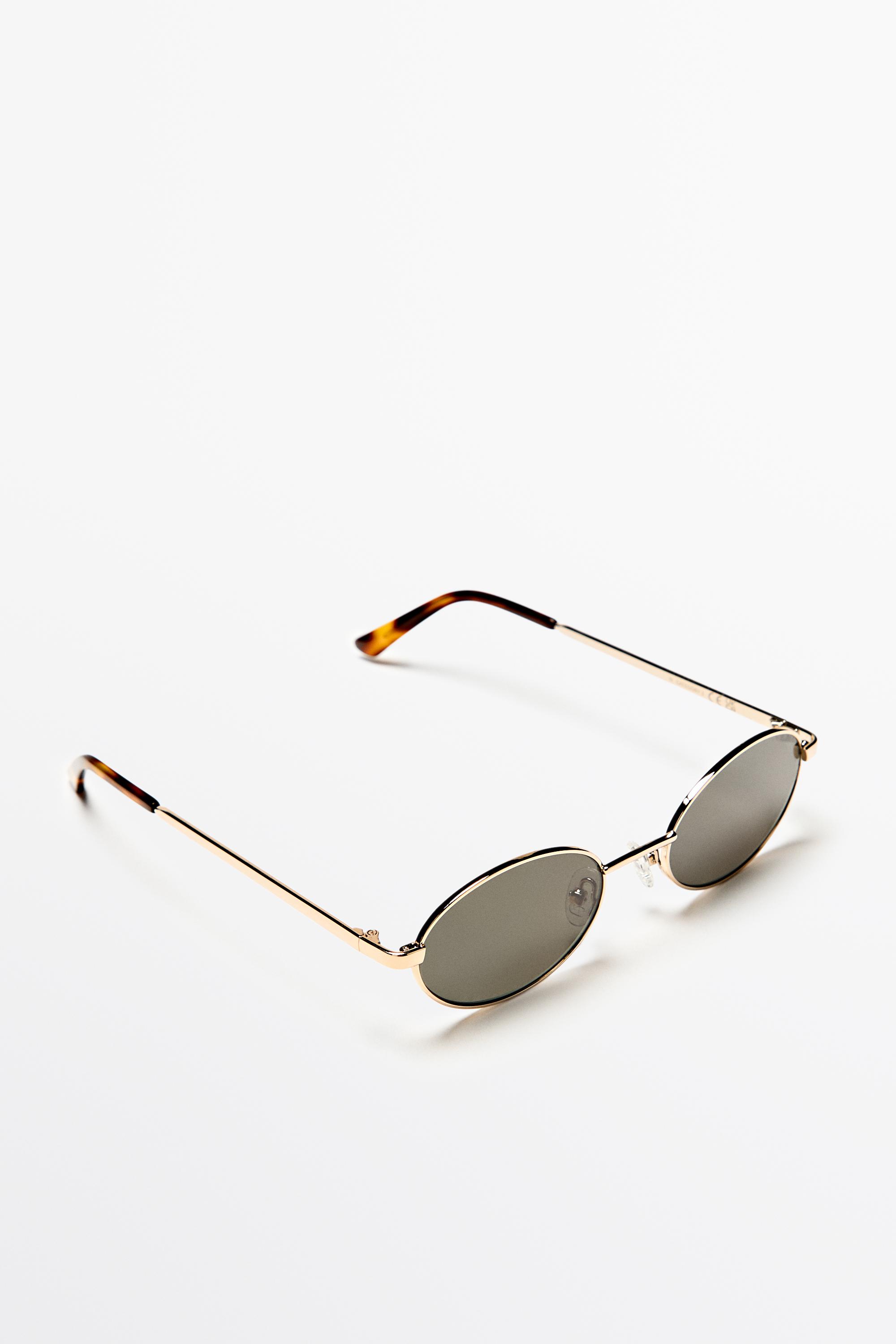 Oval metal sunglasses — GOLDEN