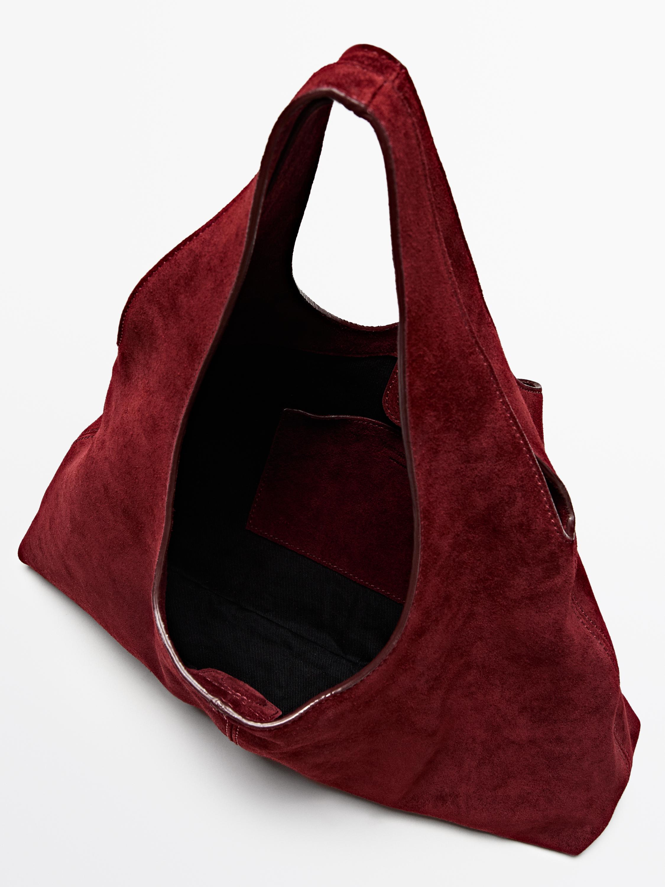 Çantë dore prej lëkure me copë kamoshi e mesme