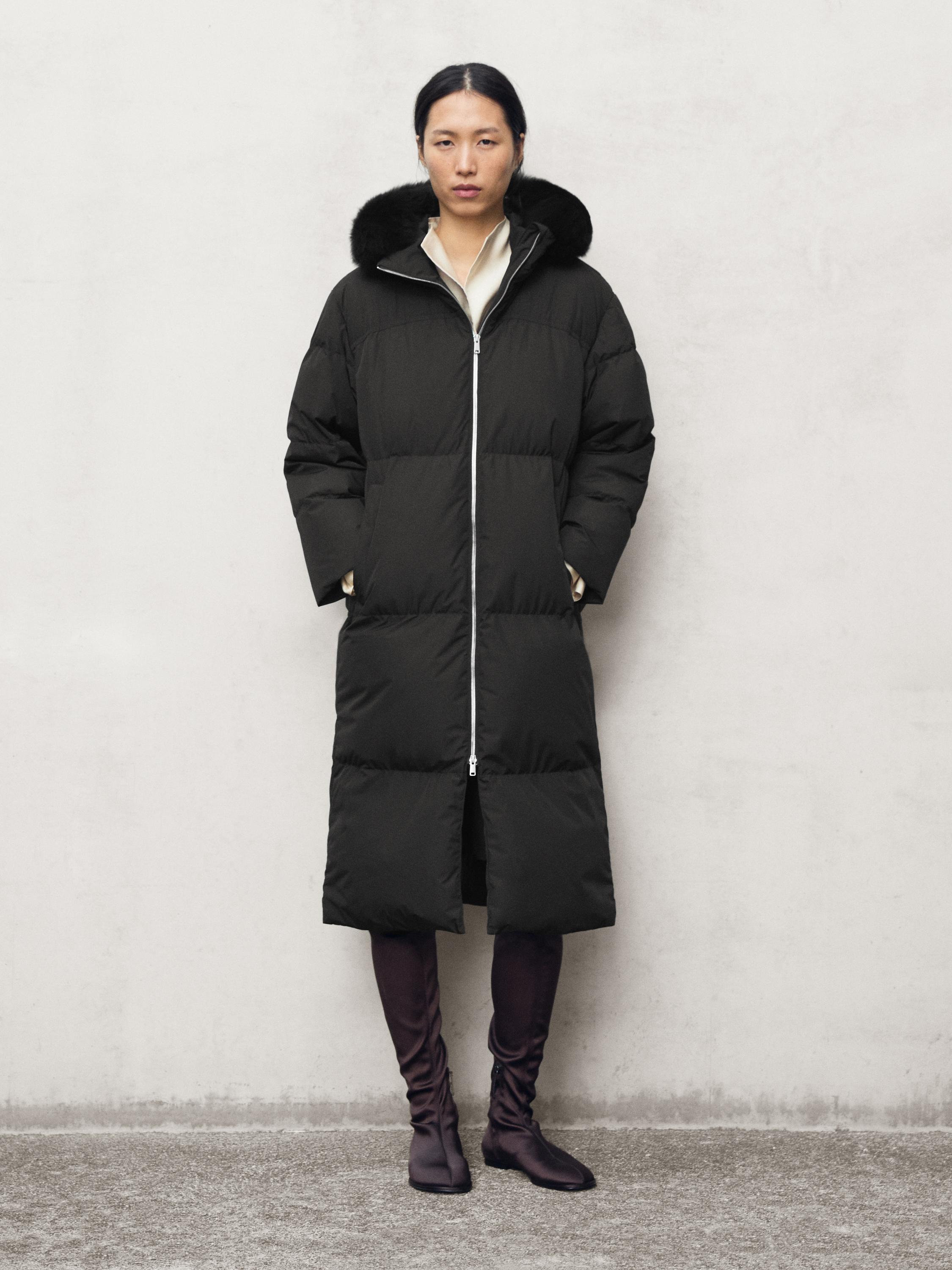 Technical down jacket with faux fur hood