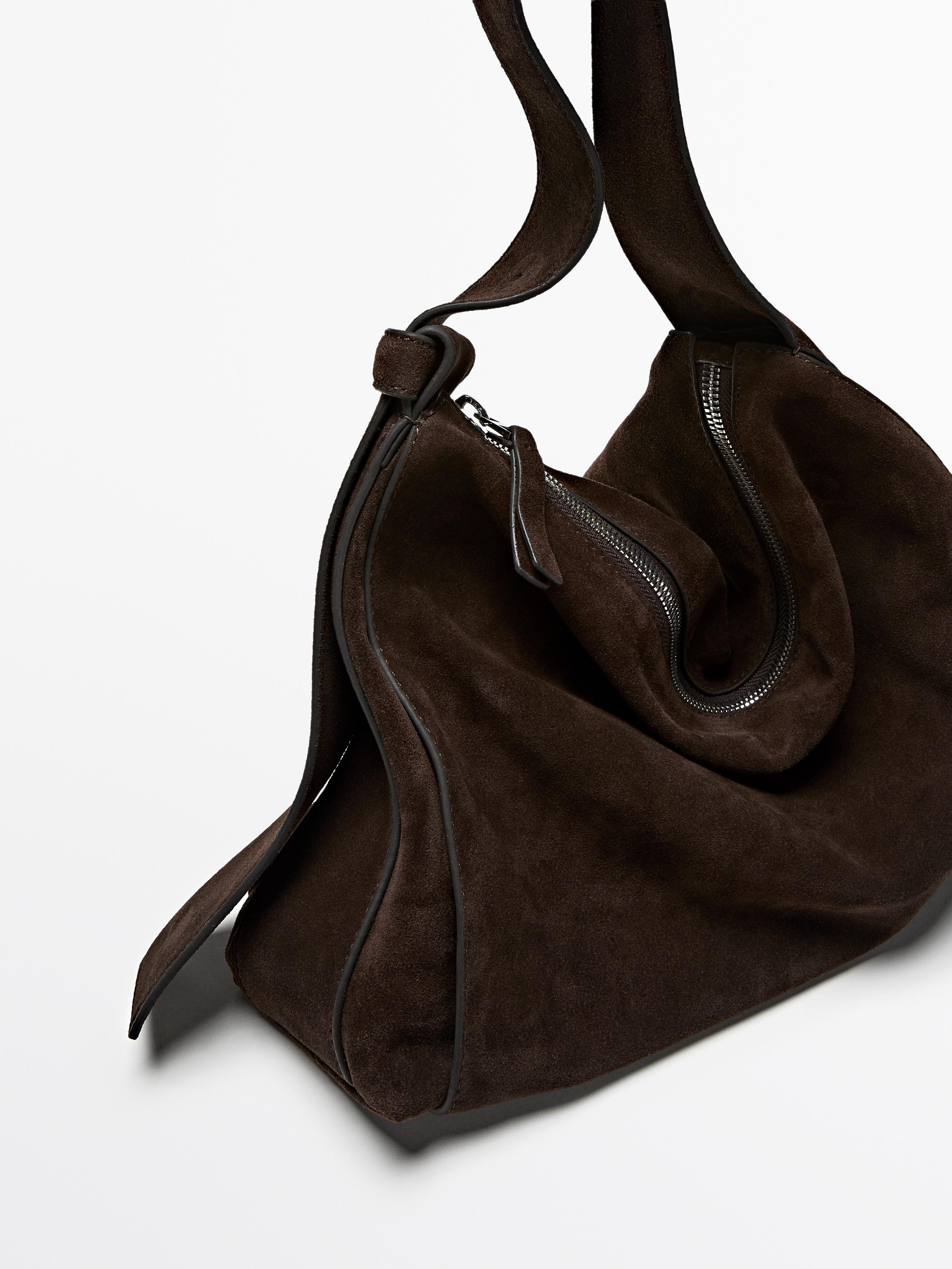 Çantë supi e madhe prej lëkure me copë kamoshi me dy faqe