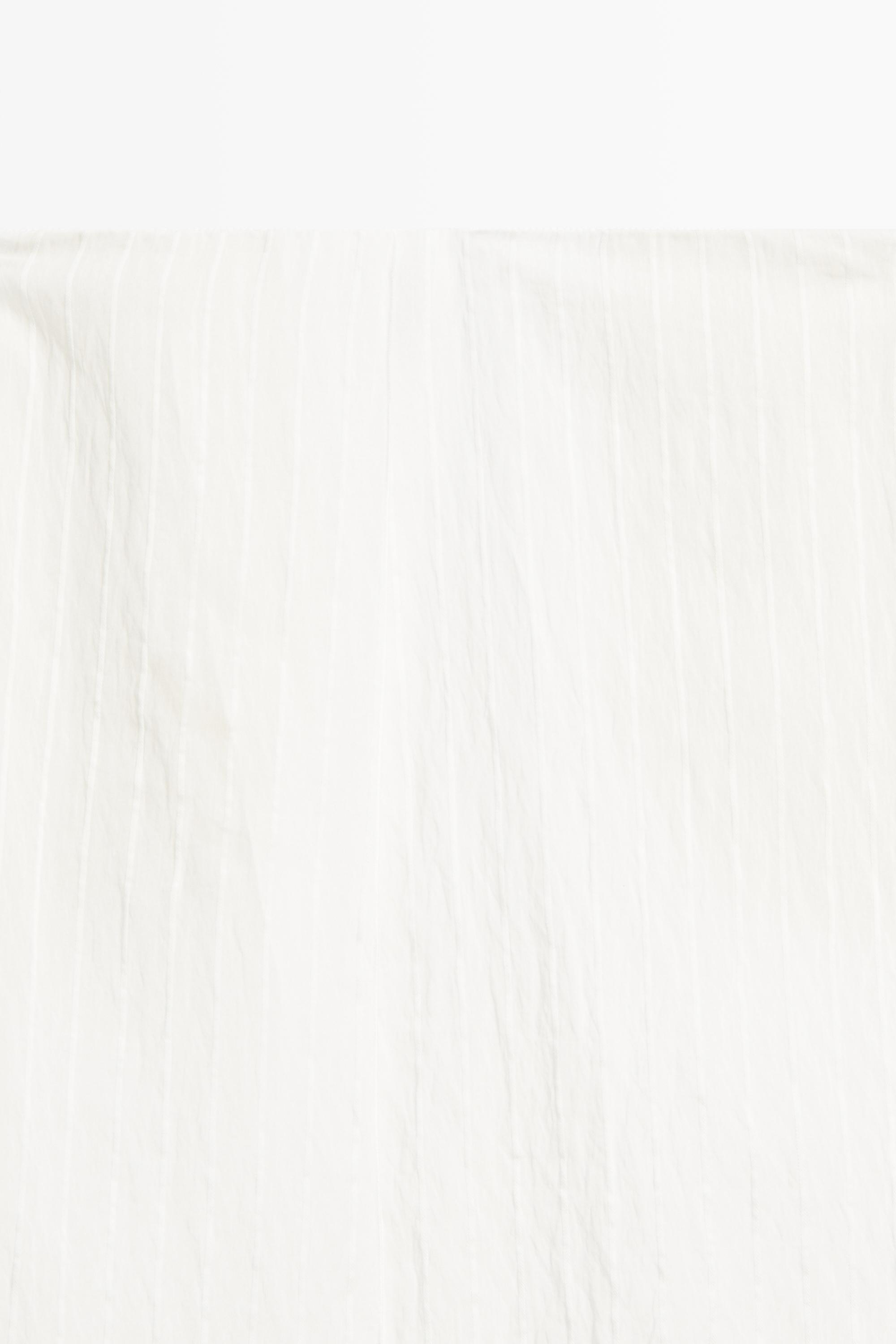 Asymmetric striped skort - STUDIO — WHITE