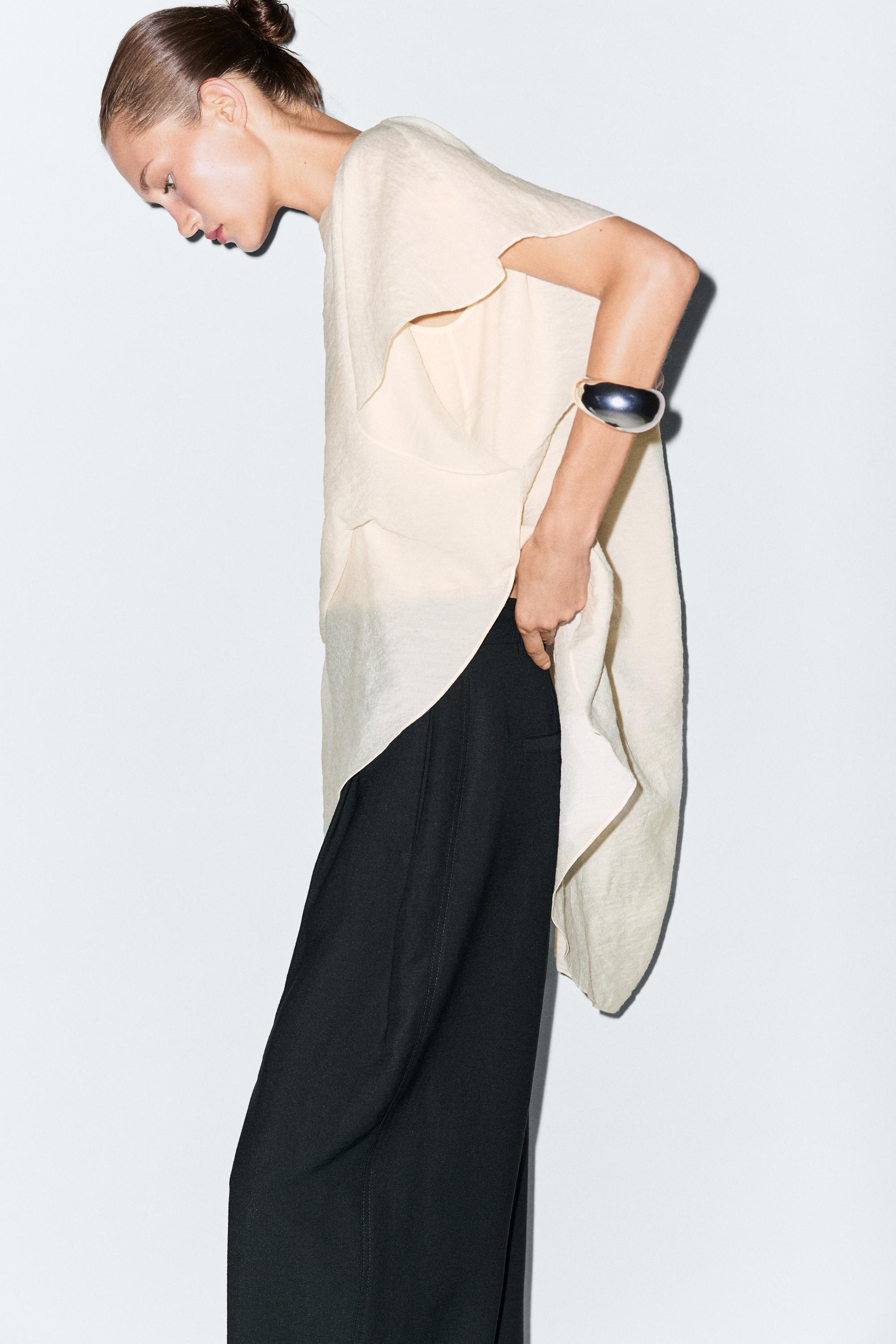 Asymmetric cape-style flowing blouse — Off white