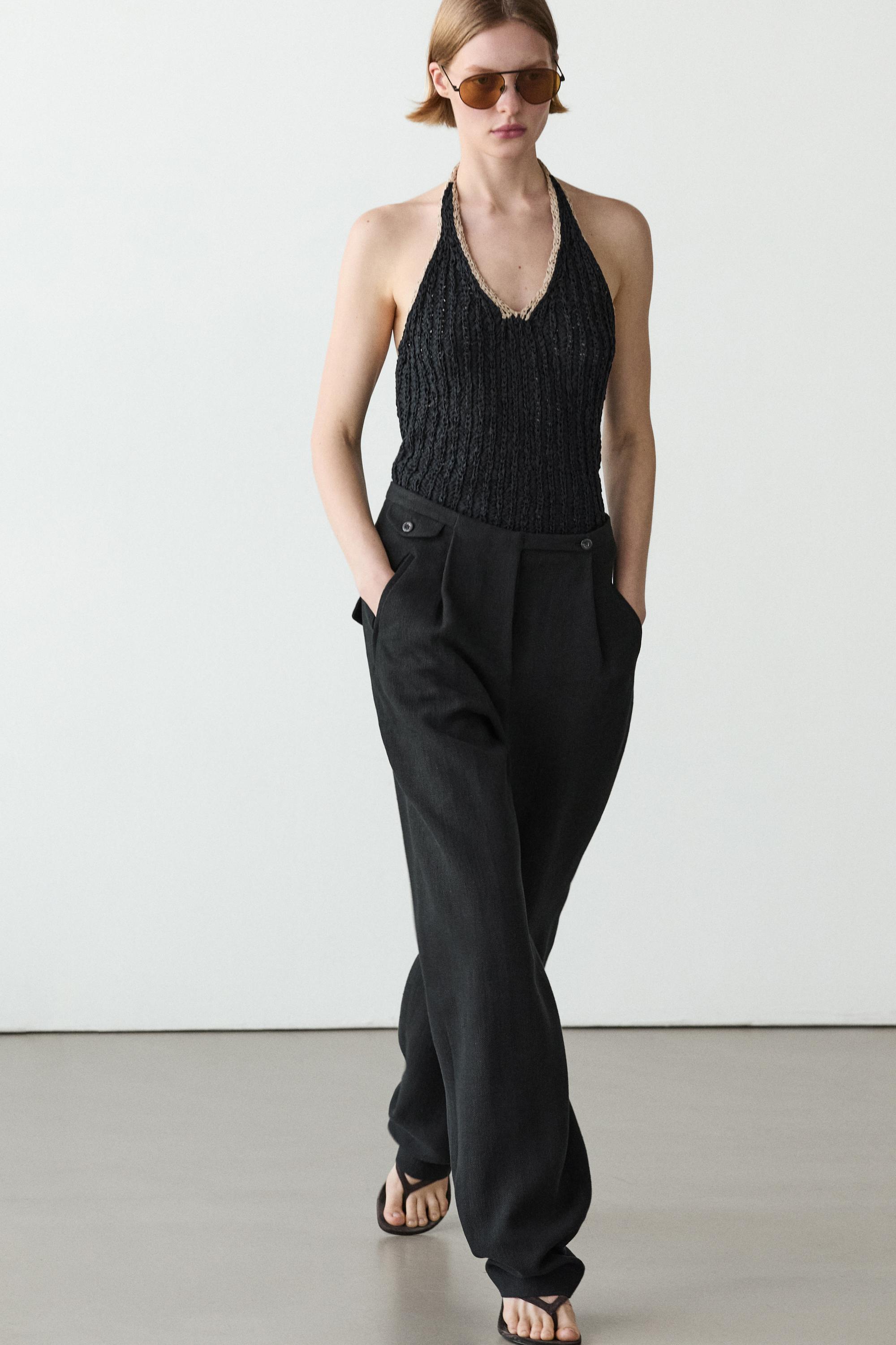 Flowing linen blend trousers with pocket details