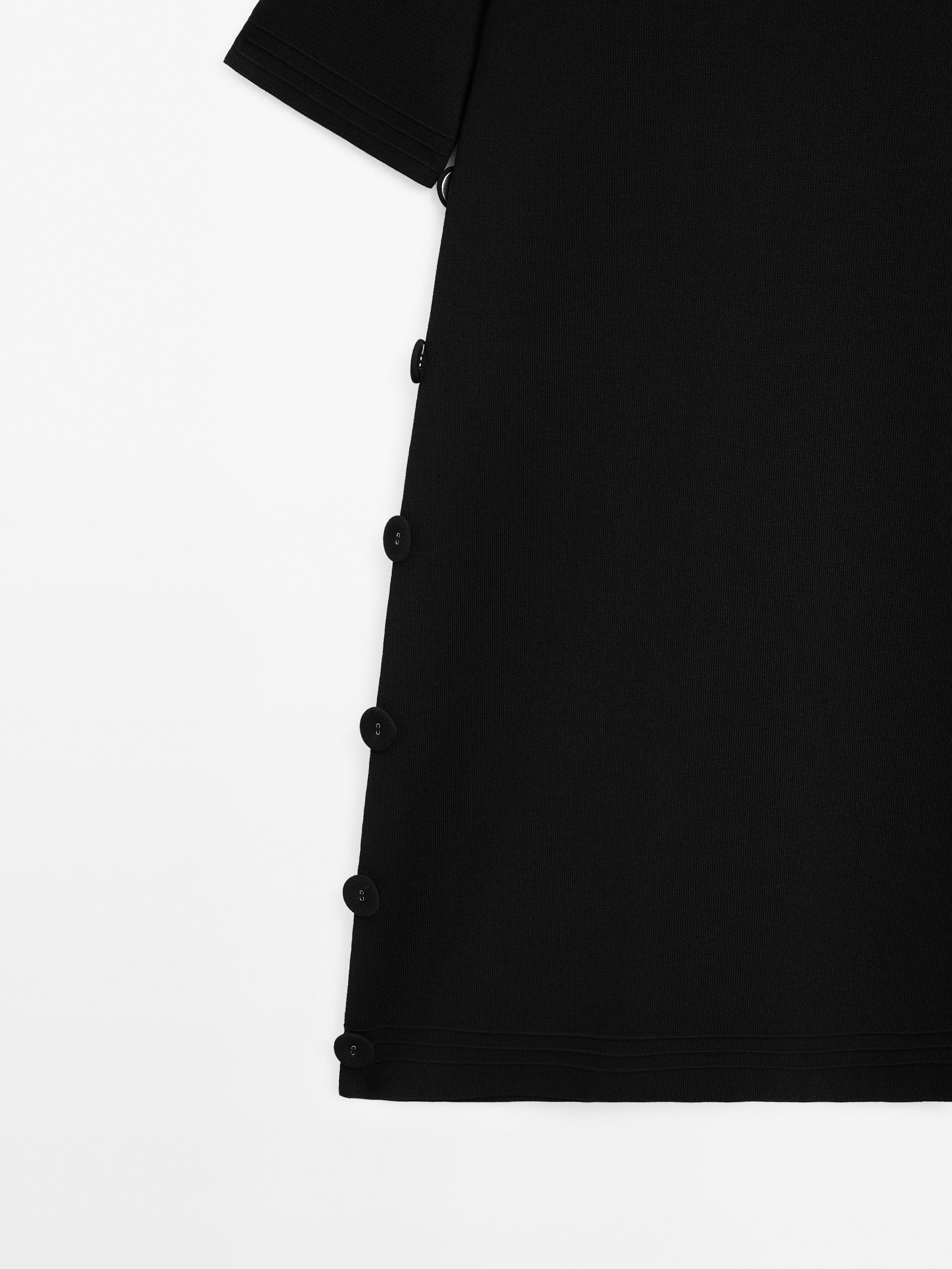 Short knit dress with side button details