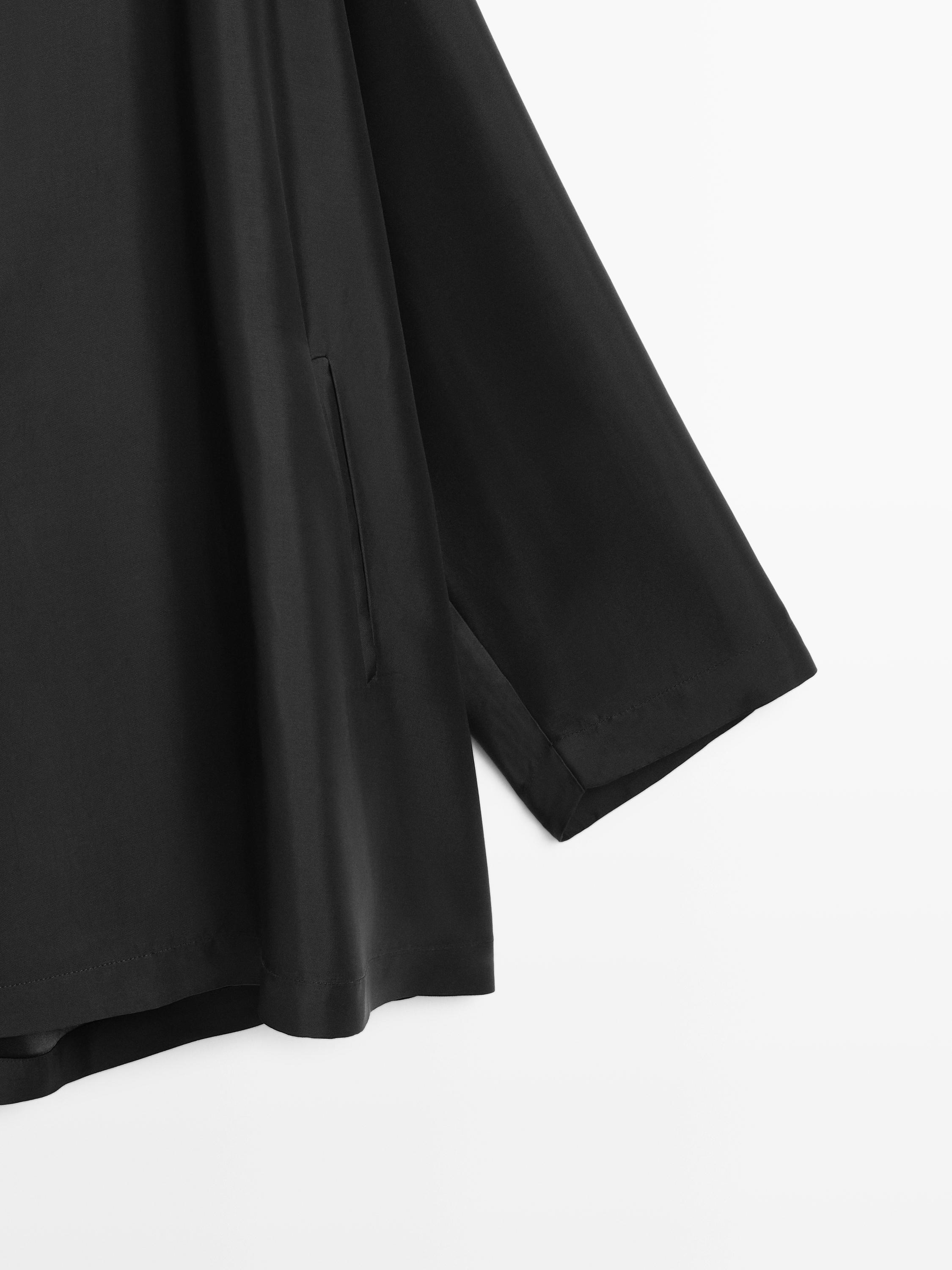 Flowing voluminous cape with button details — BLACK