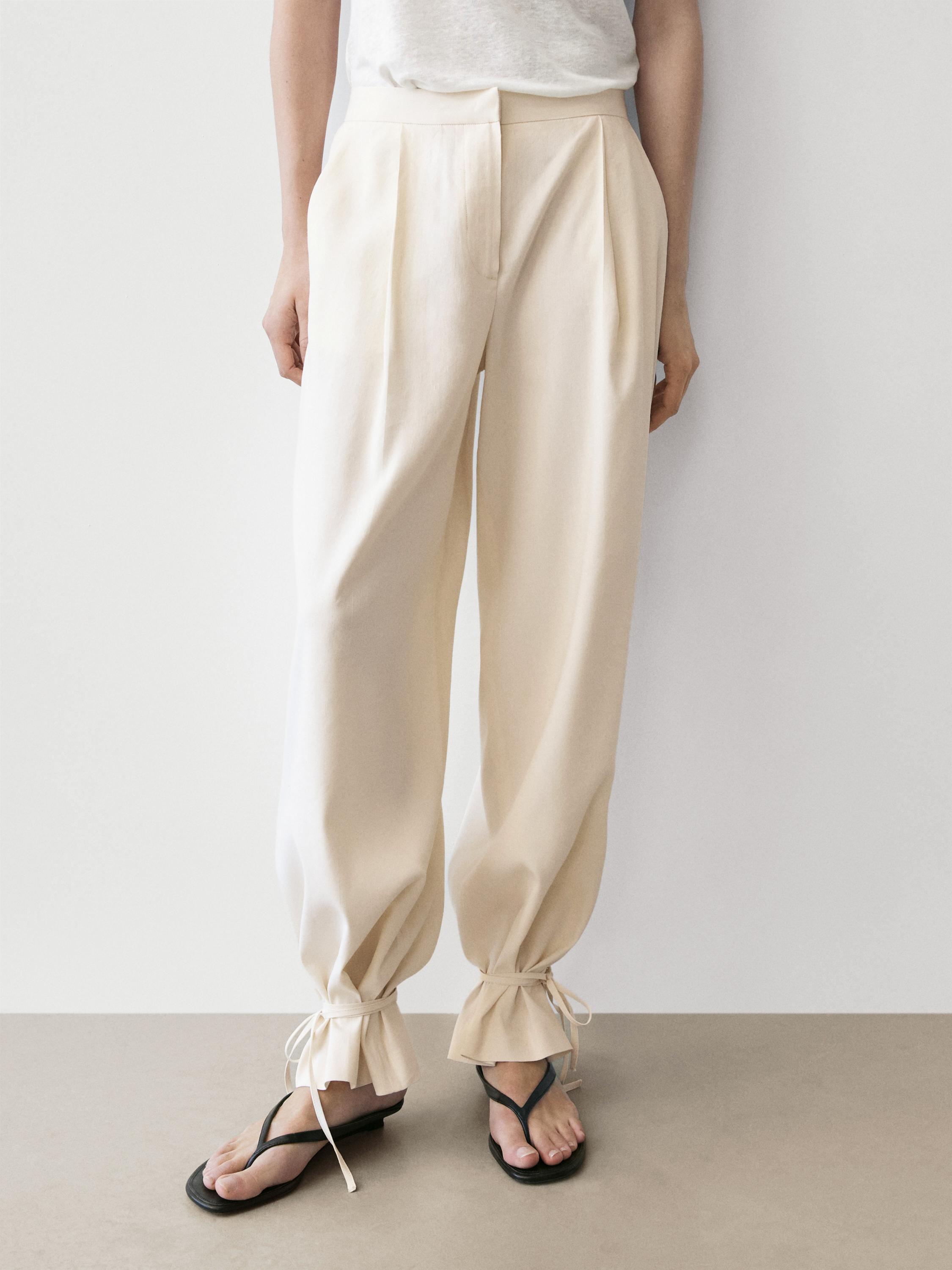 Flowing barrel fit trousers — CREAM
