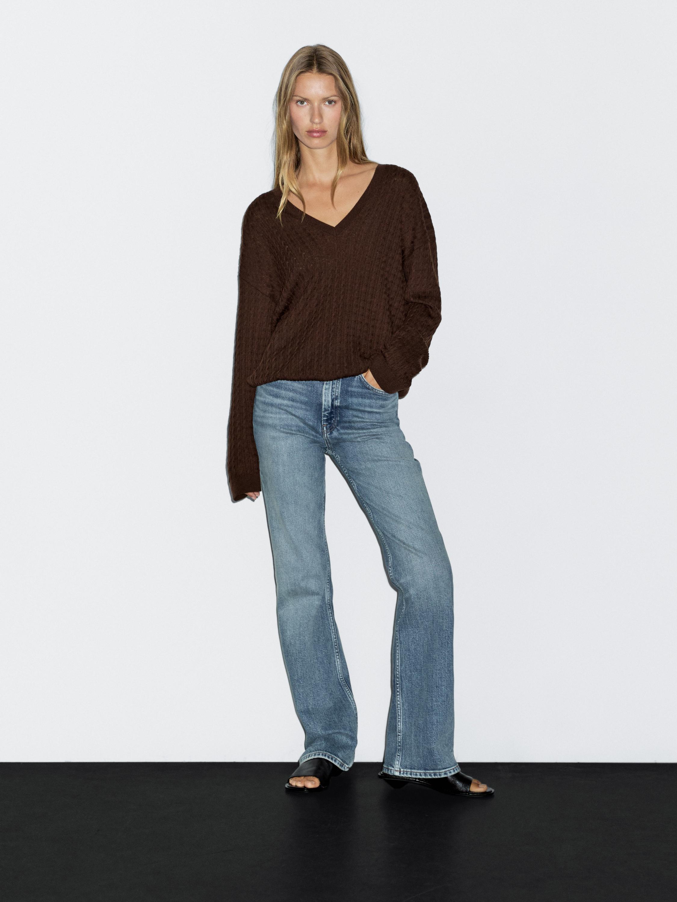 V-neck cable-knit sweater