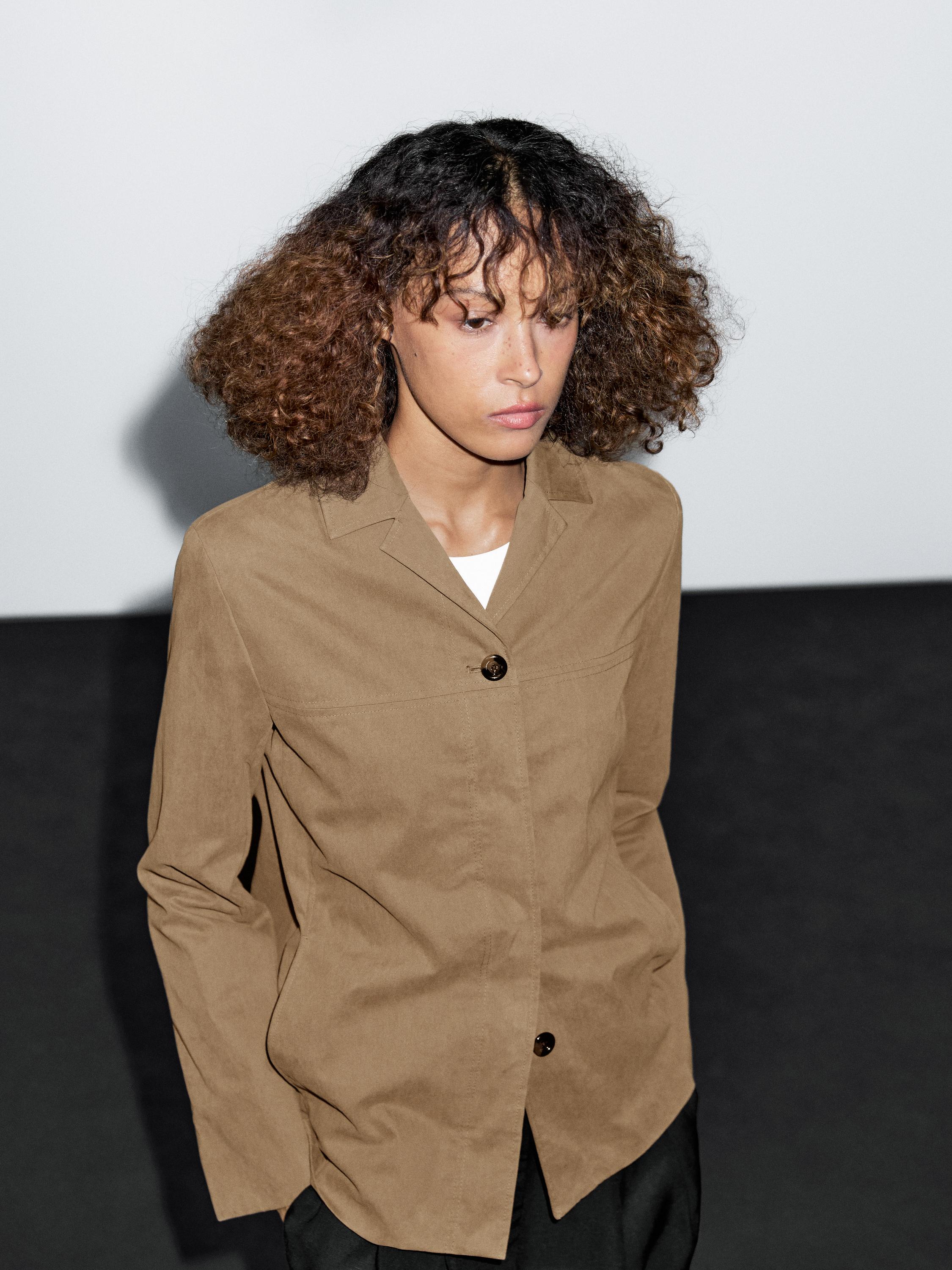 Cotton blend blazer with button detail