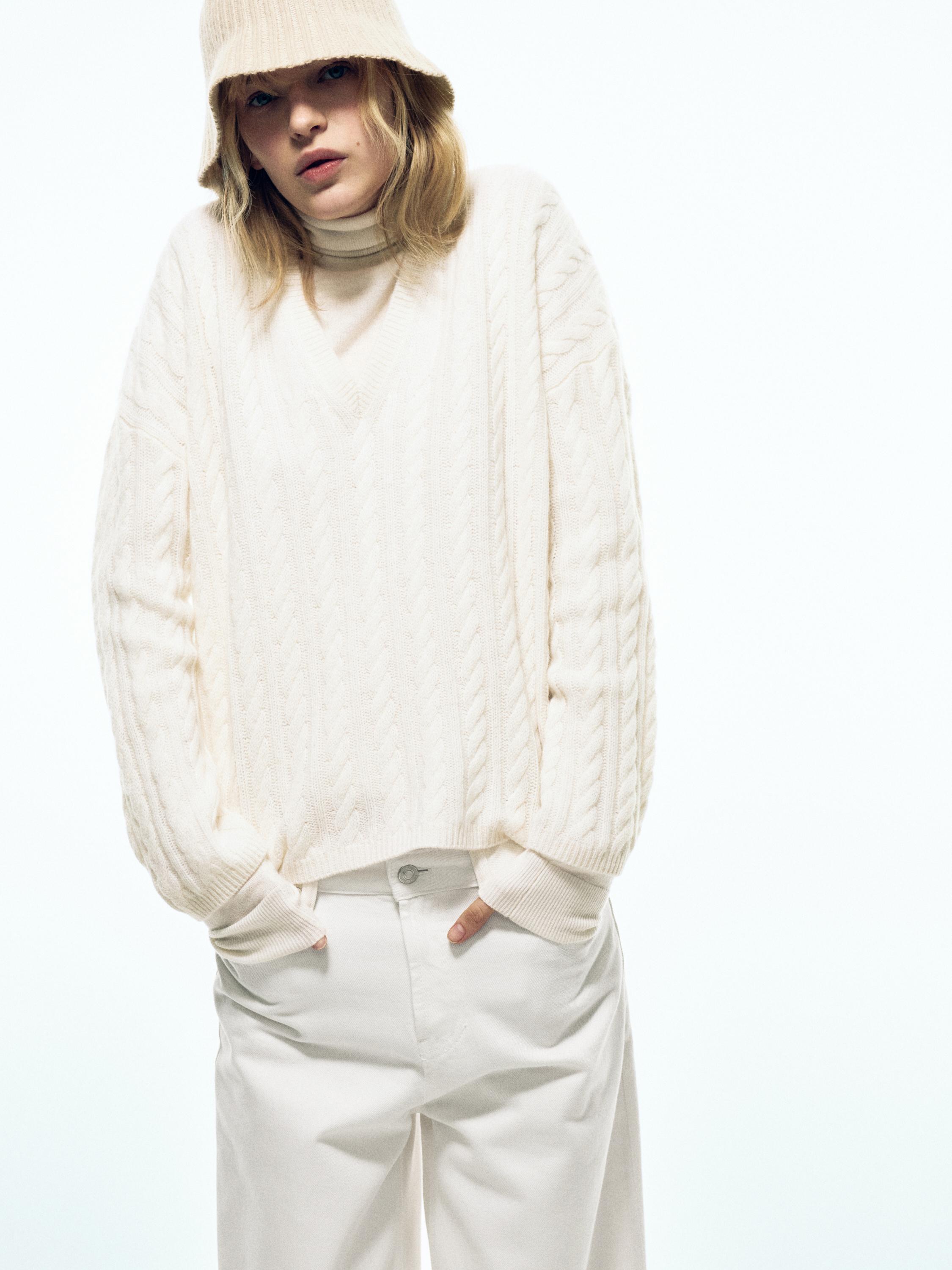 Cable-knit V-neck sweater