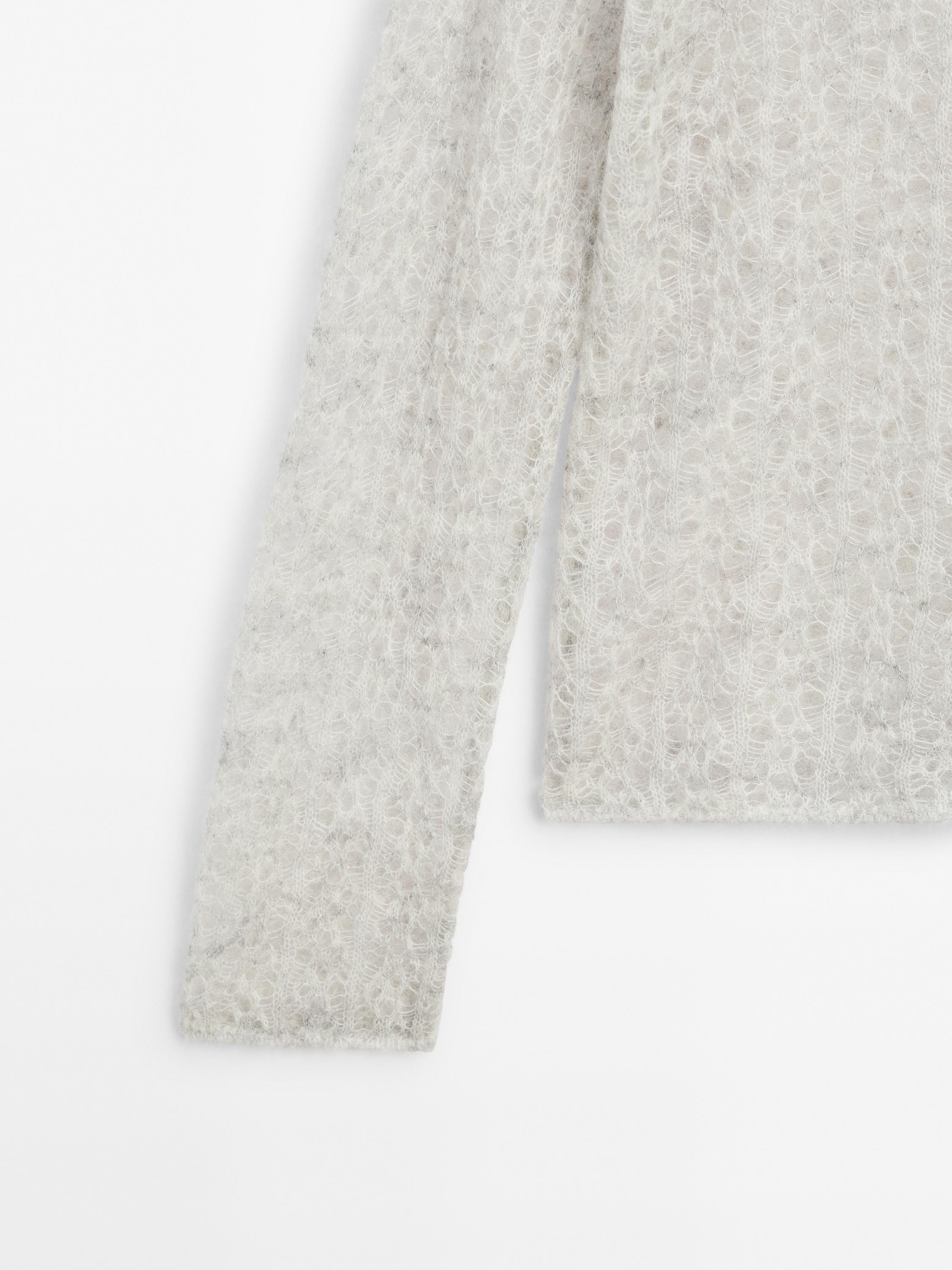 Cutwork wool blend sweater