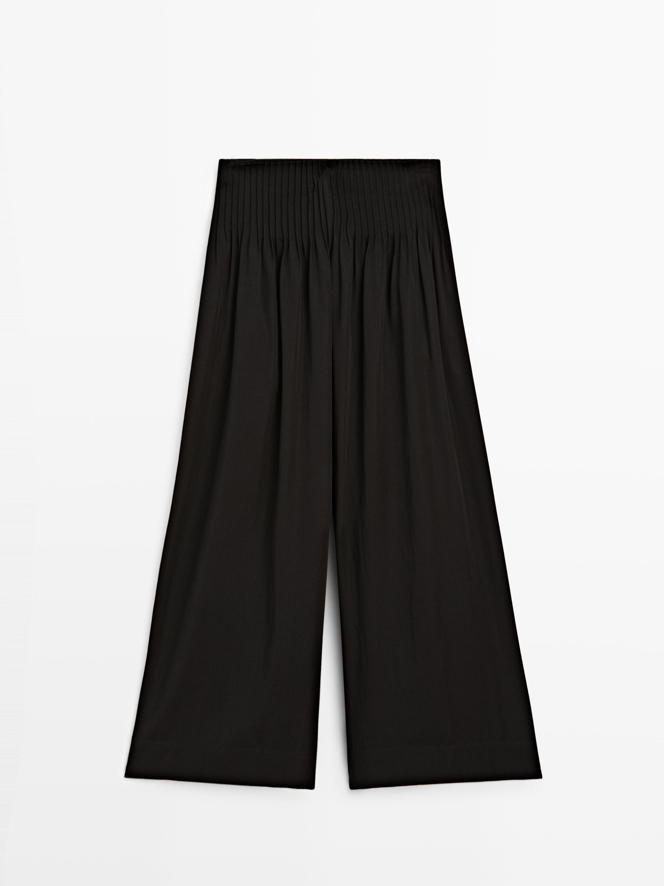 Flowing wide-leg pants — BLACK